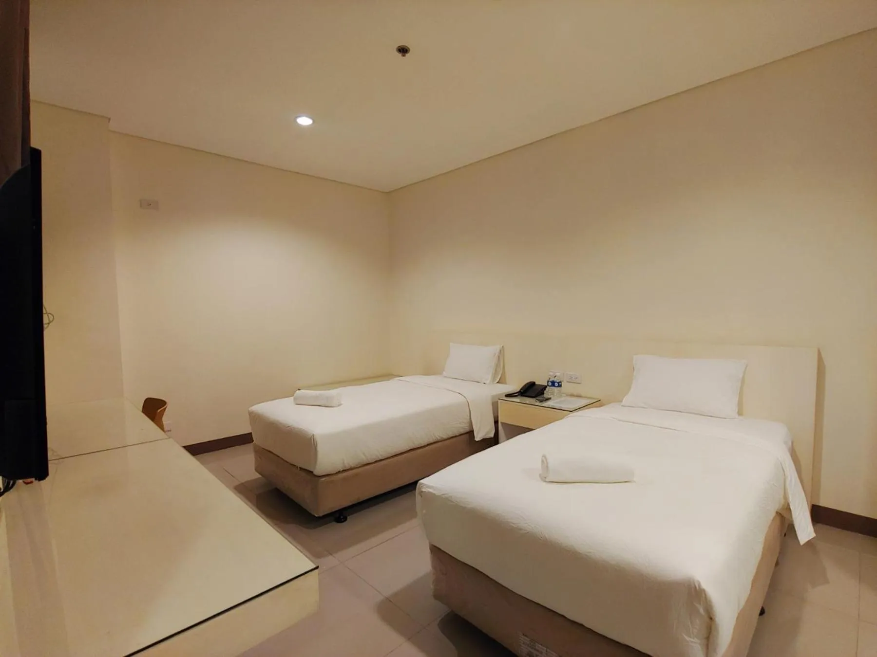 Bed in Kaizen Suites