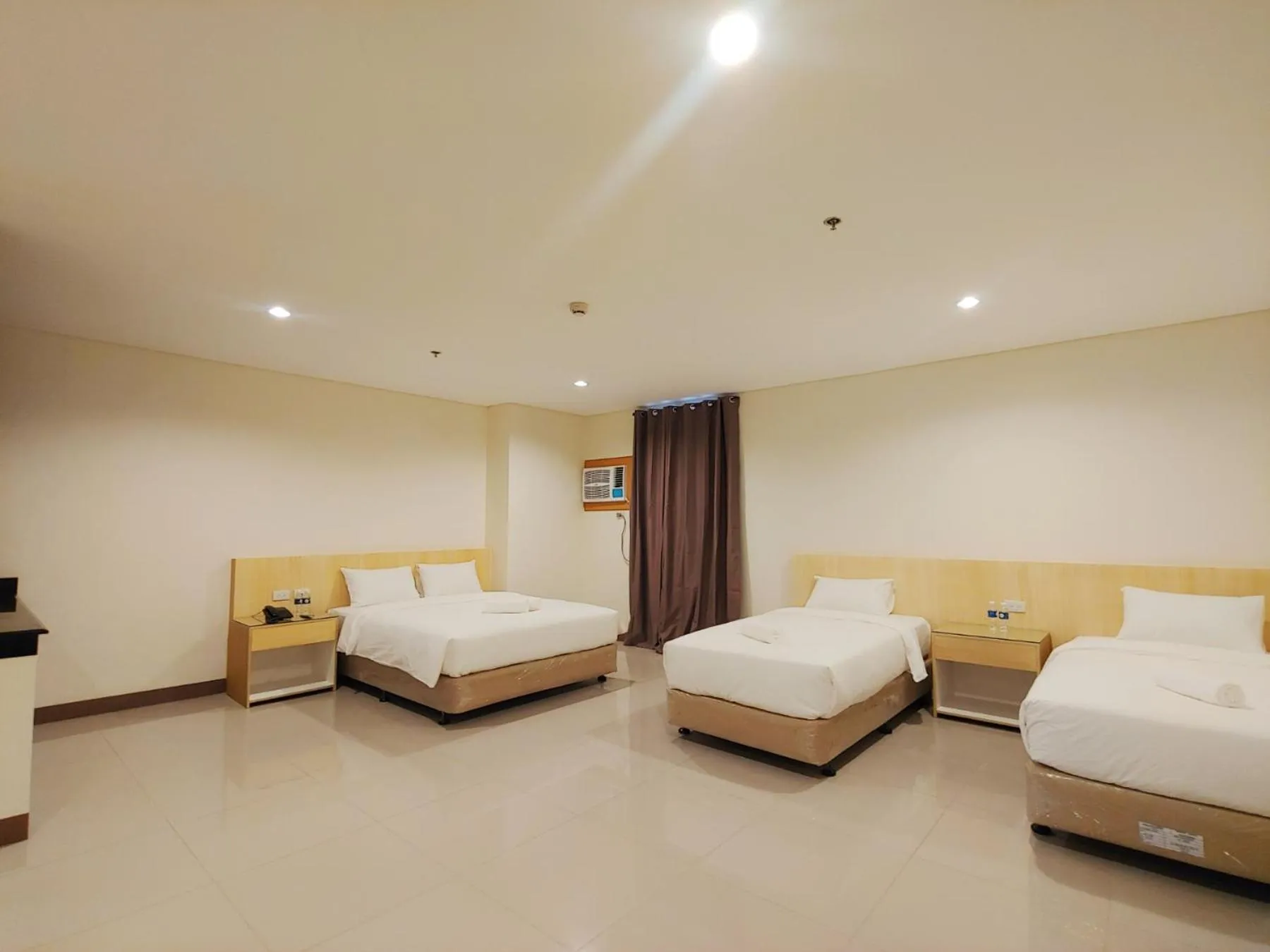 Photo of the whole room, Bed in Kaizen Suites