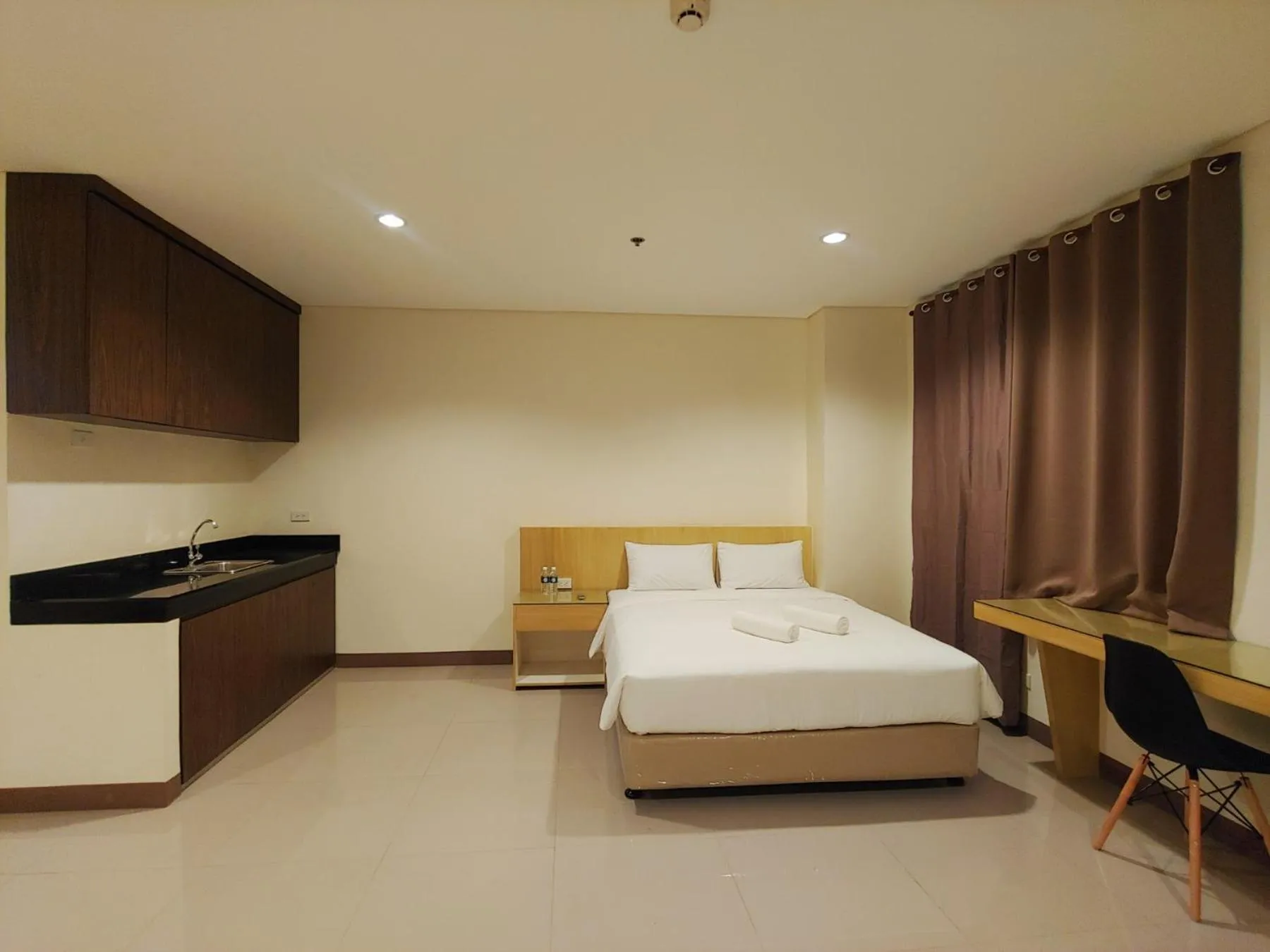 Photo of the whole room, Bed in Kaizen Suites