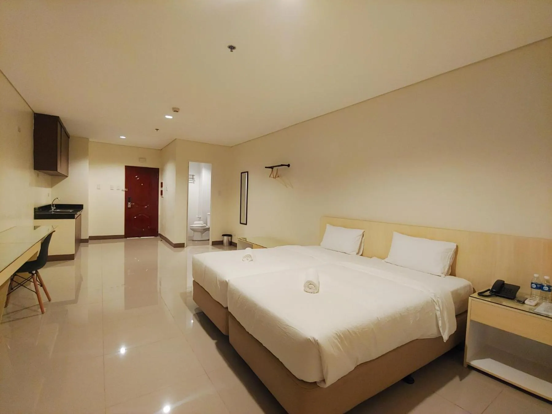Photo of the whole room, Bed in Kaizen Suites