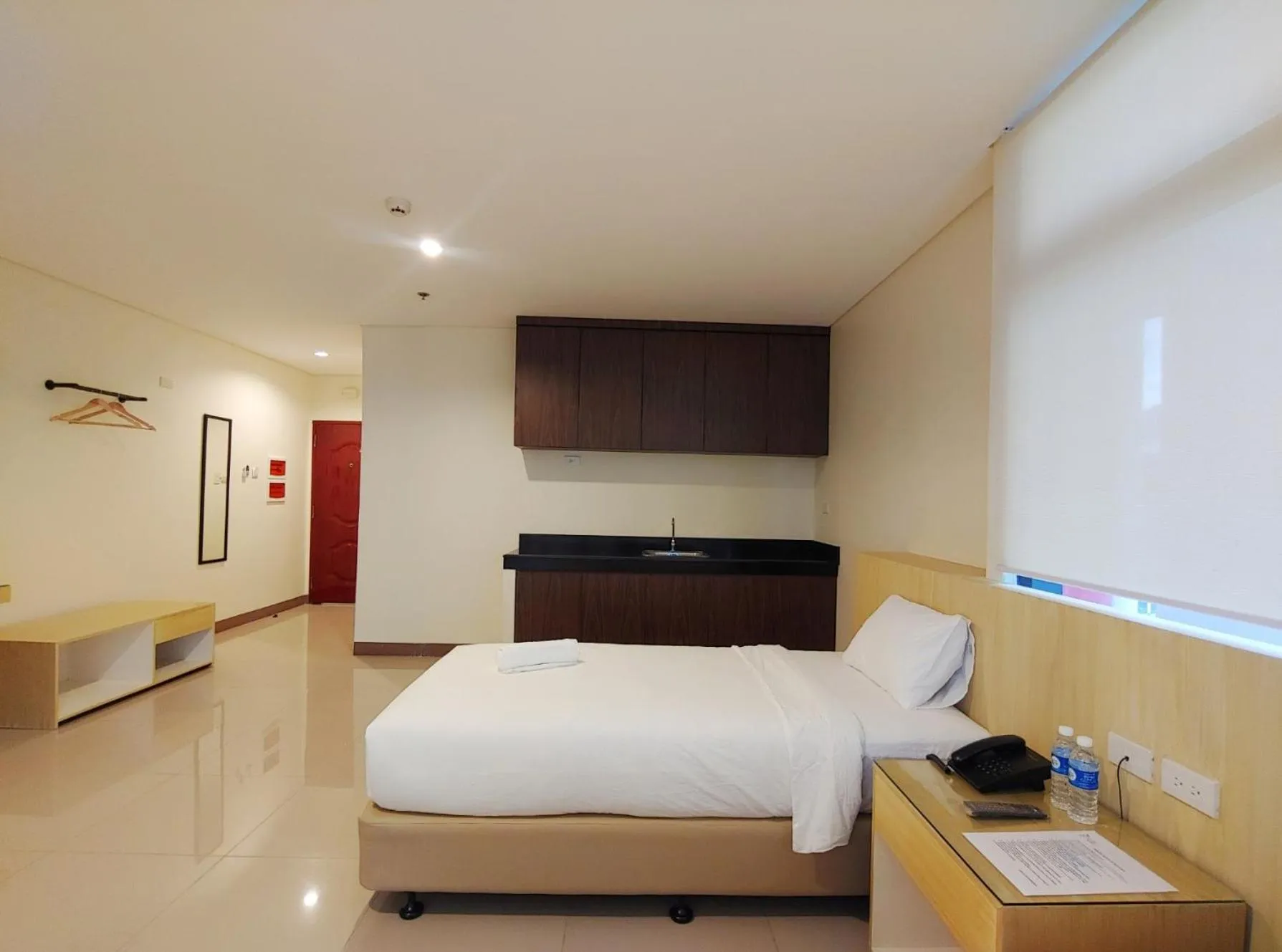 Photo of the whole room, Bed in Kaizen Suites