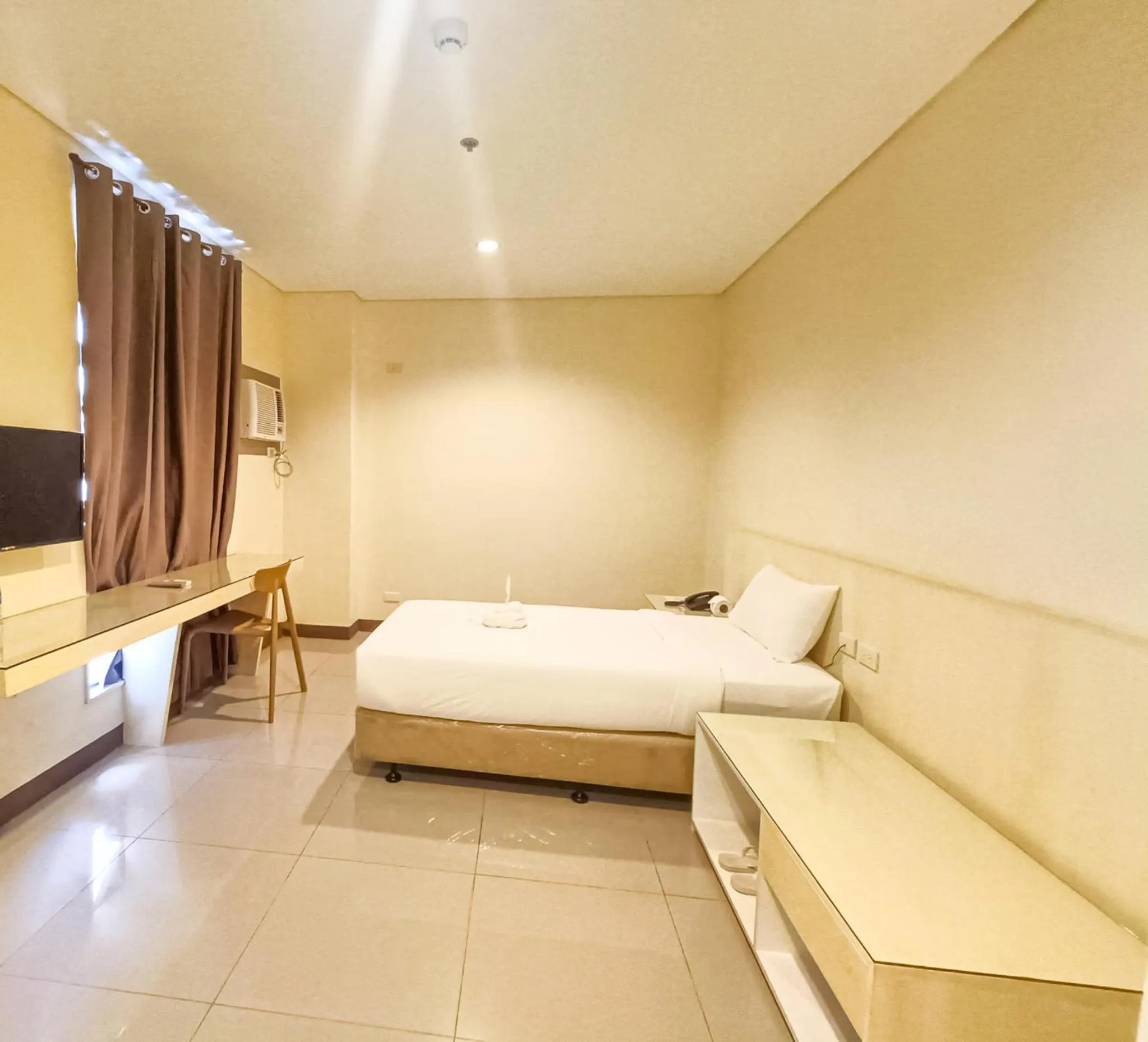 Bed in Kaizen Suites