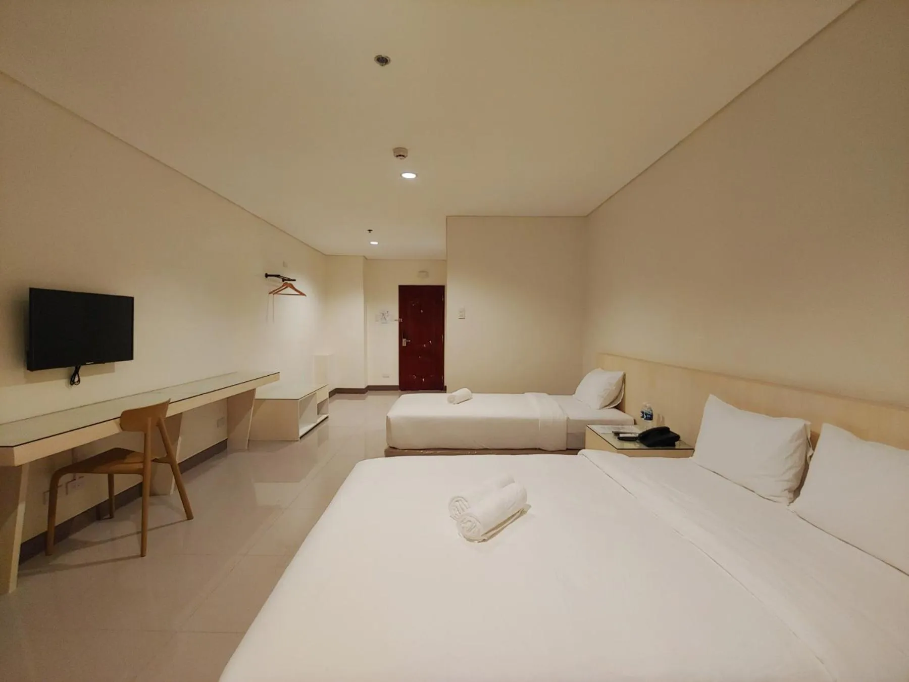 Photo of the whole room, Bed in Kaizen Suites