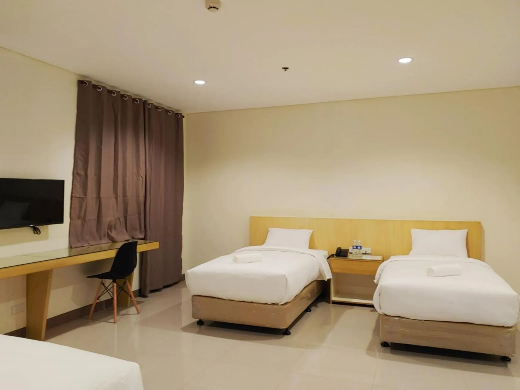 Photo of the whole room, Bed in Kaizen Suites