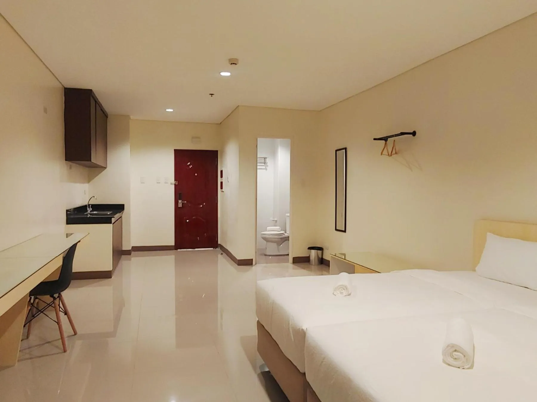 Photo of the whole room, Bed in Kaizen Suites