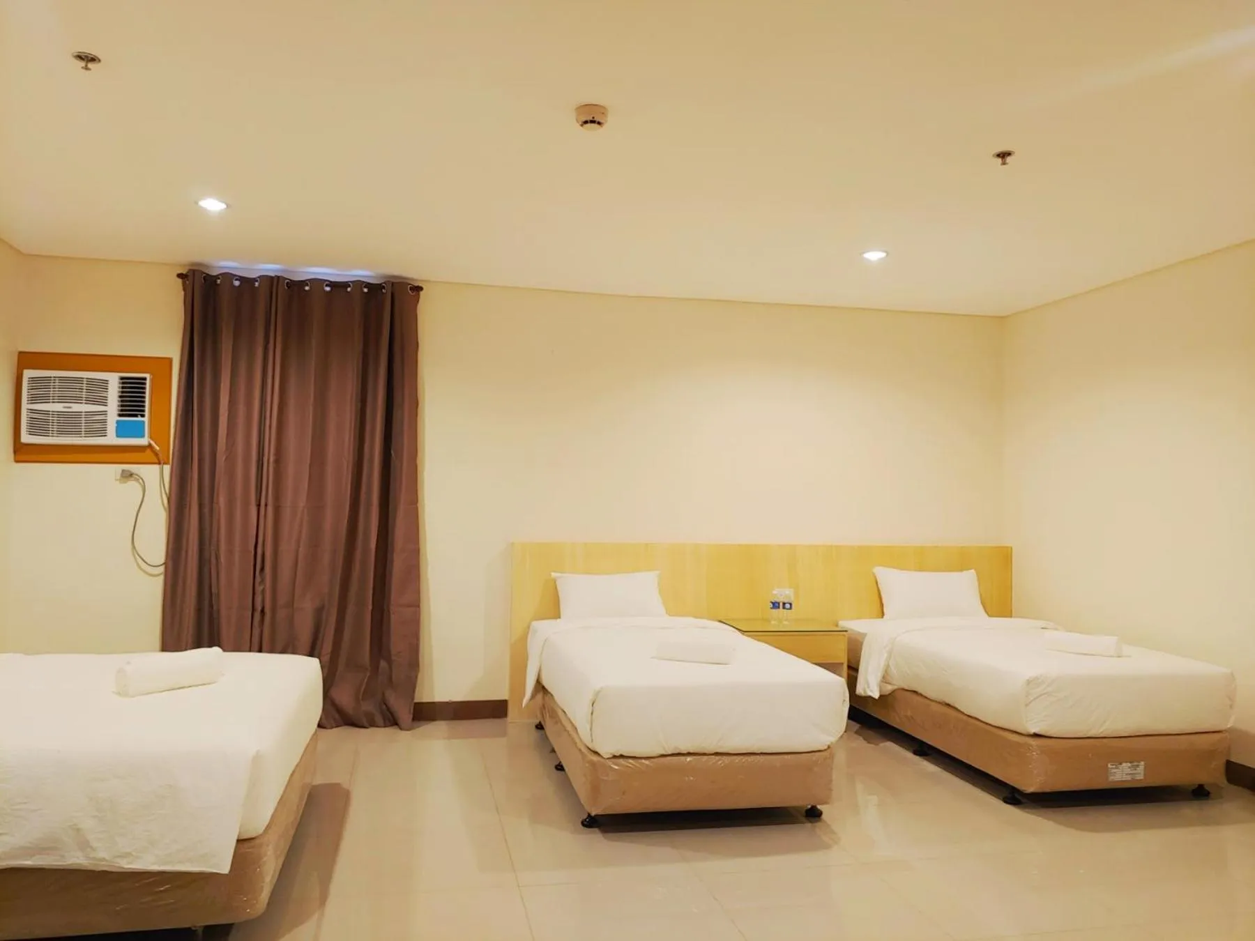 Bed in Kaizen Suites