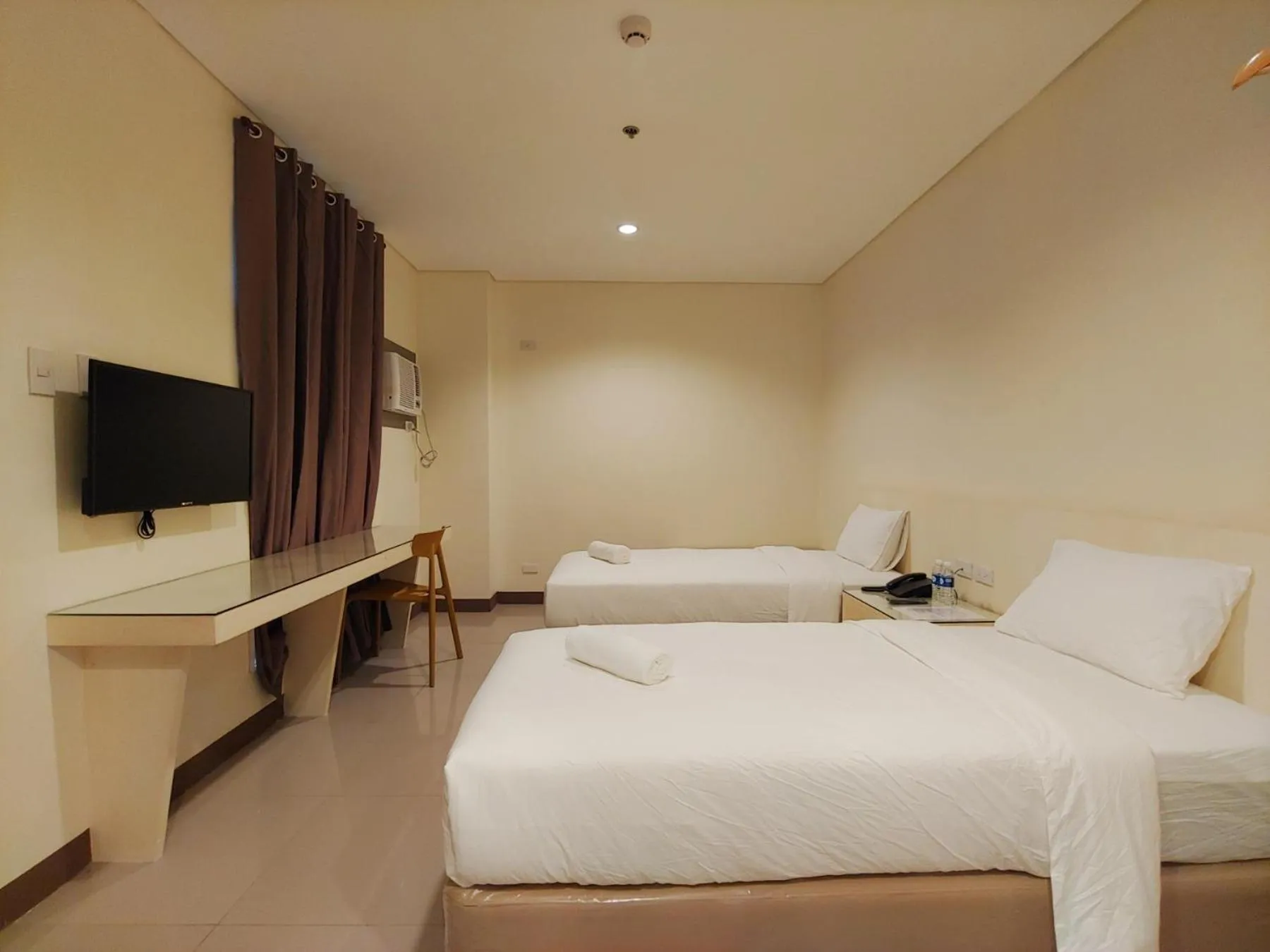 Photo of the whole room, Bed in Kaizen Suites