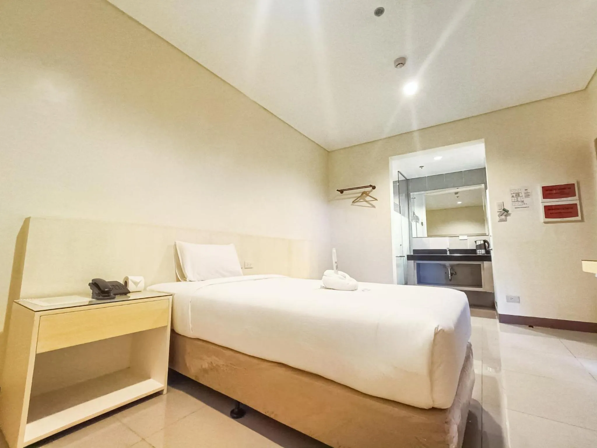 Photo of the whole room, Bed in Kaizen Suites