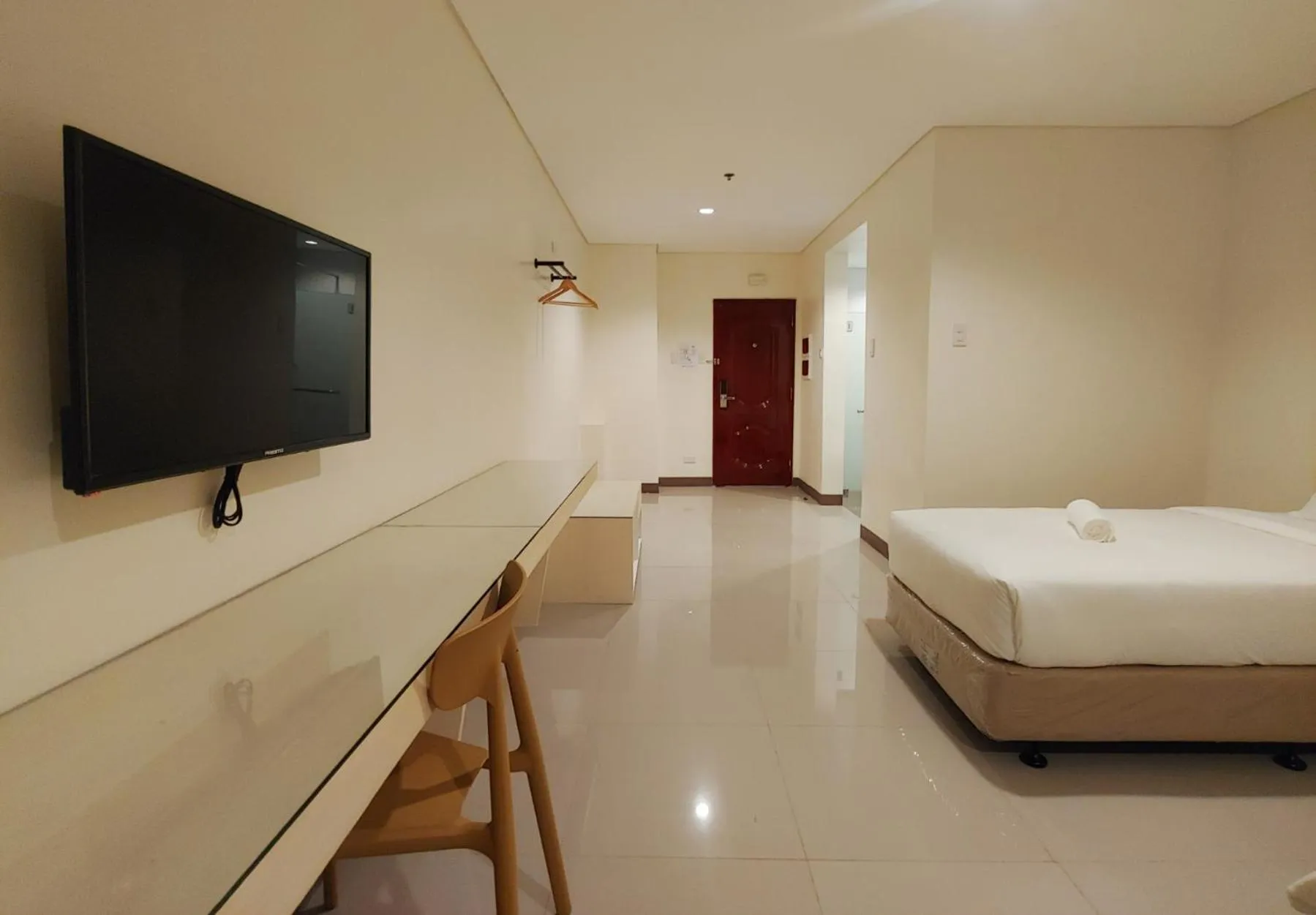 Photo of the whole room, Bed in Kaizen Suites