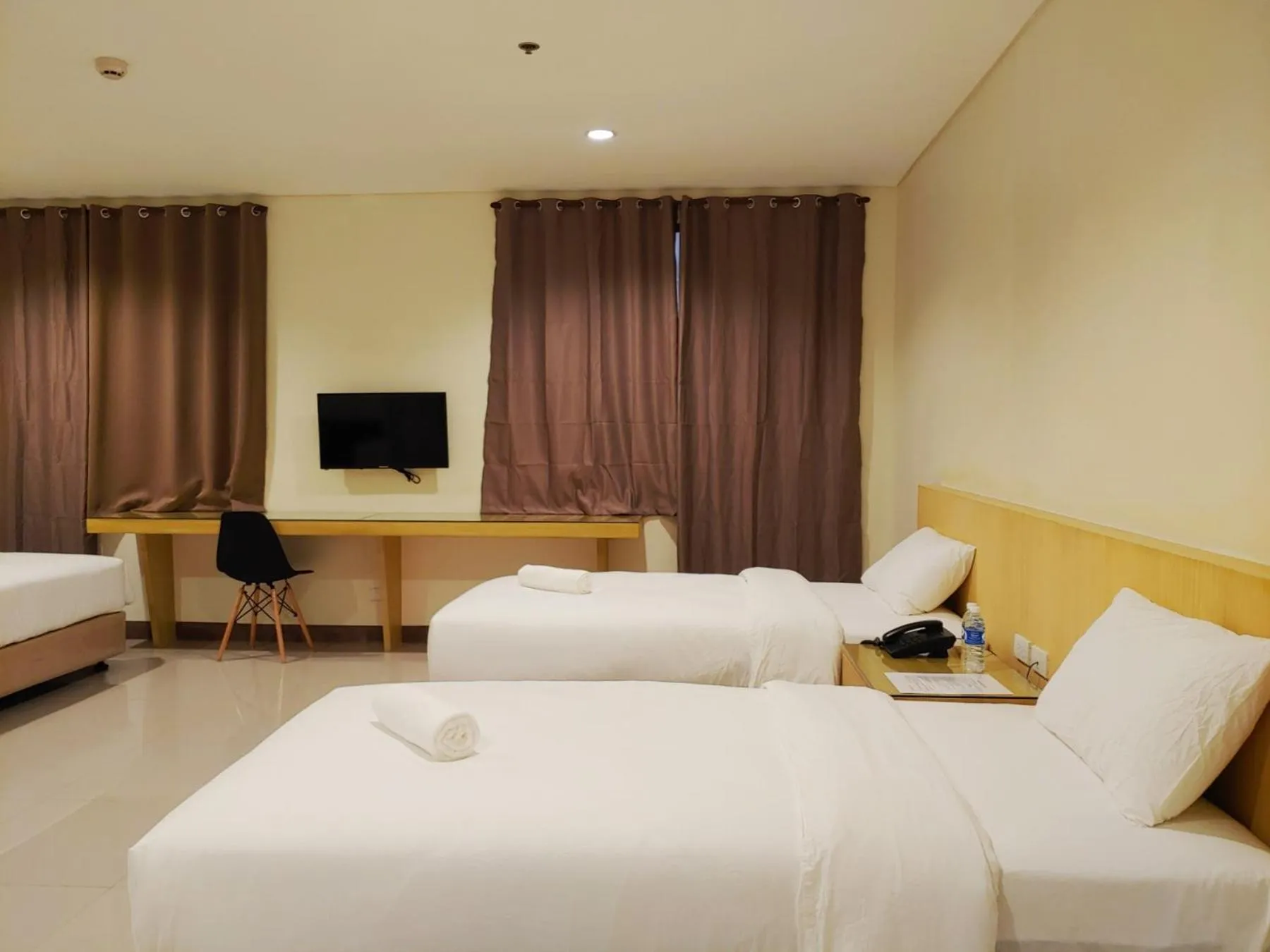 Photo of the whole room, Bed in Kaizen Suites