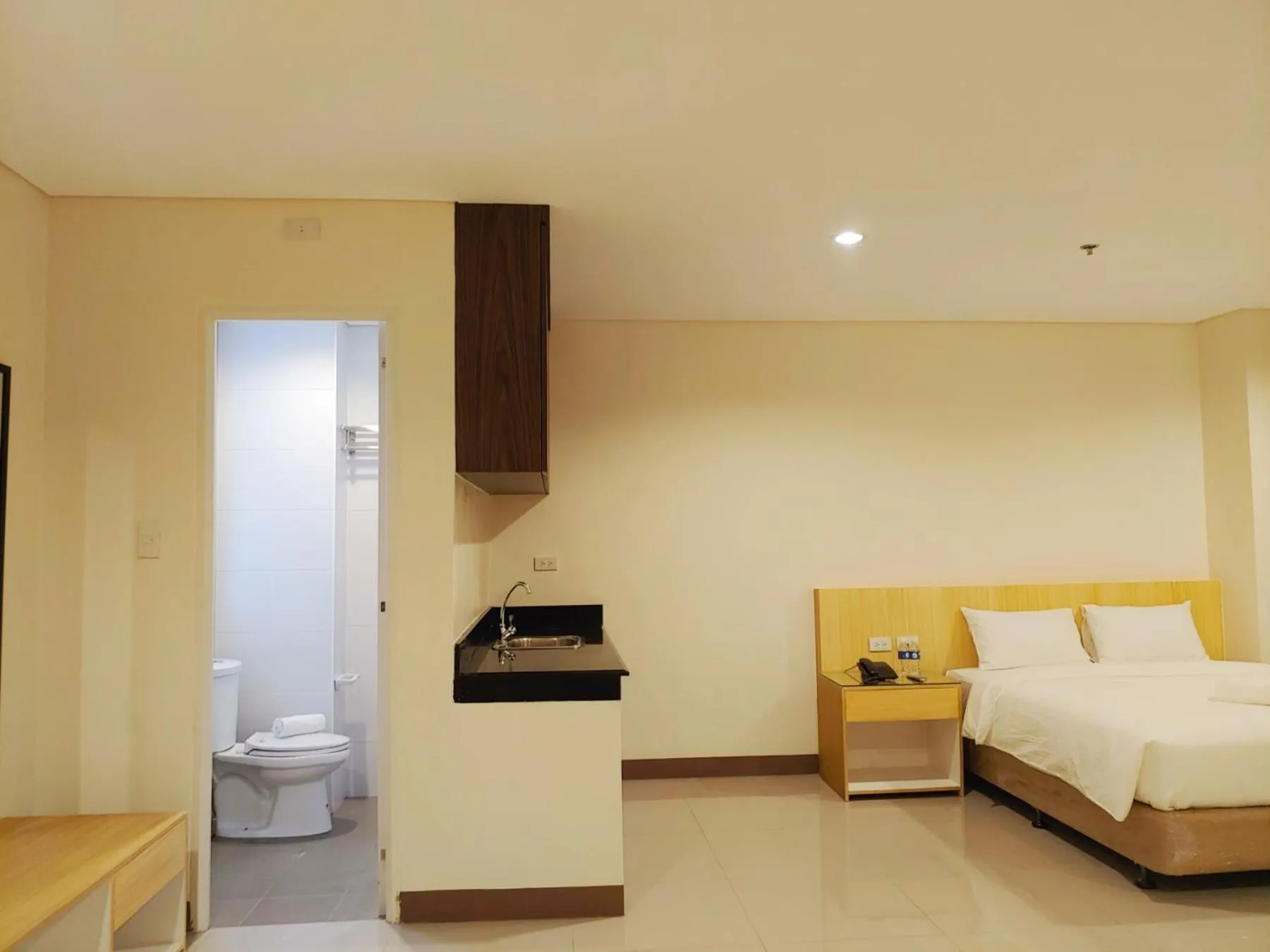 Photo of the whole room, Bed in Kaizen Suites