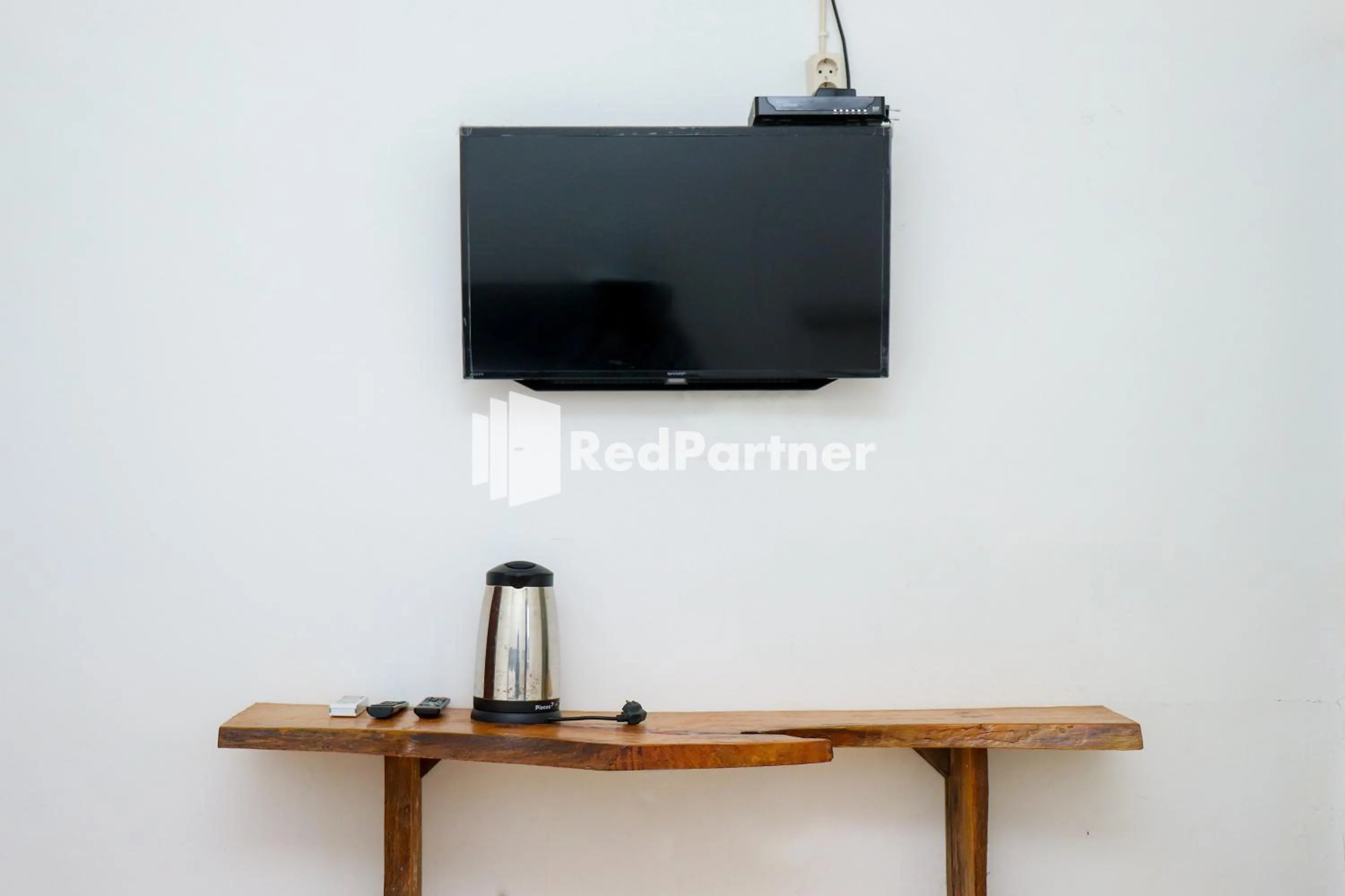 Bedroom in Sahabat Pantai Guest House Mitra RedDoorz