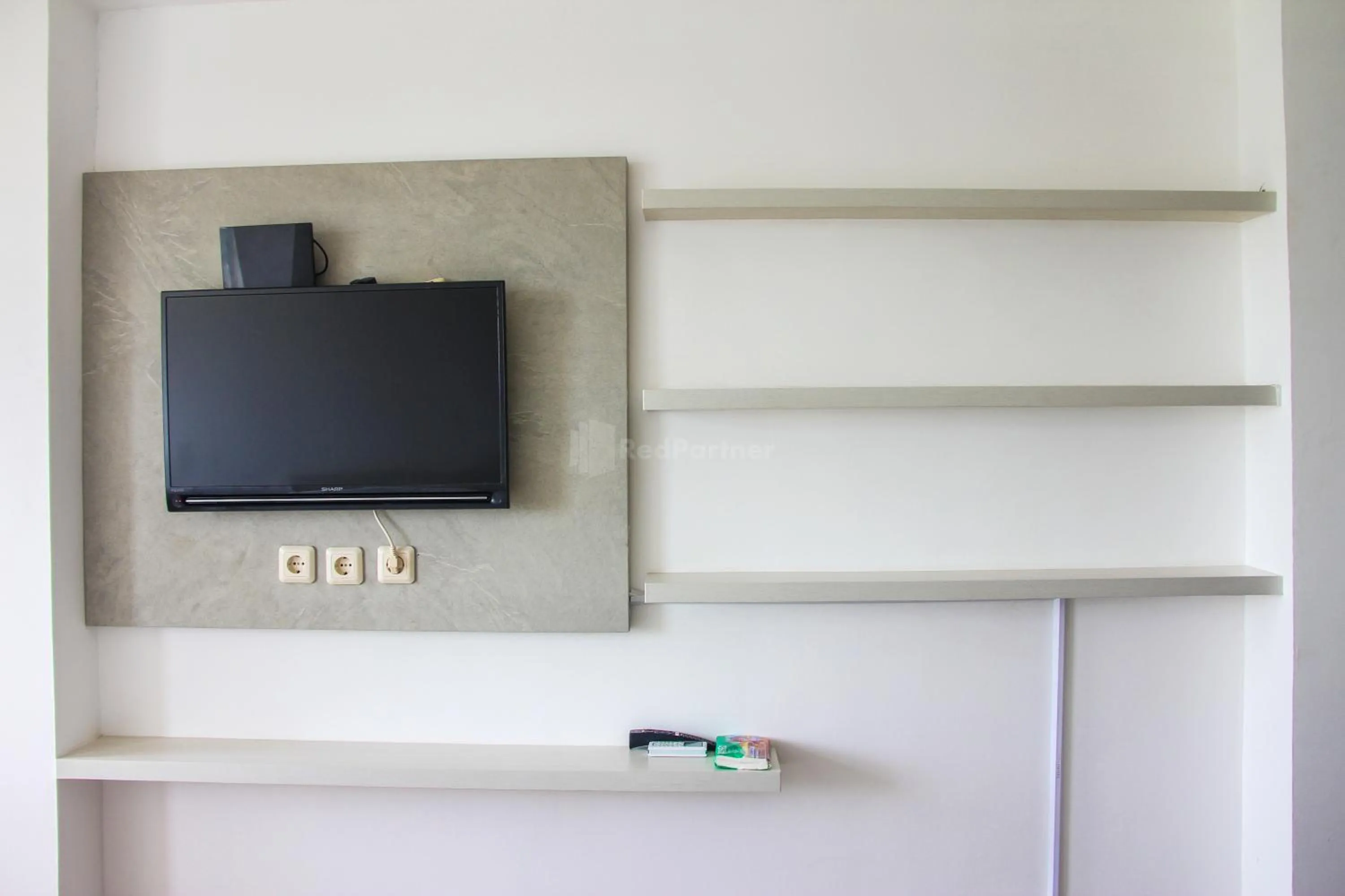 Bedroom in RedLiving Apartemen Gunung Putri Square - Abidin Room Tower Pinus