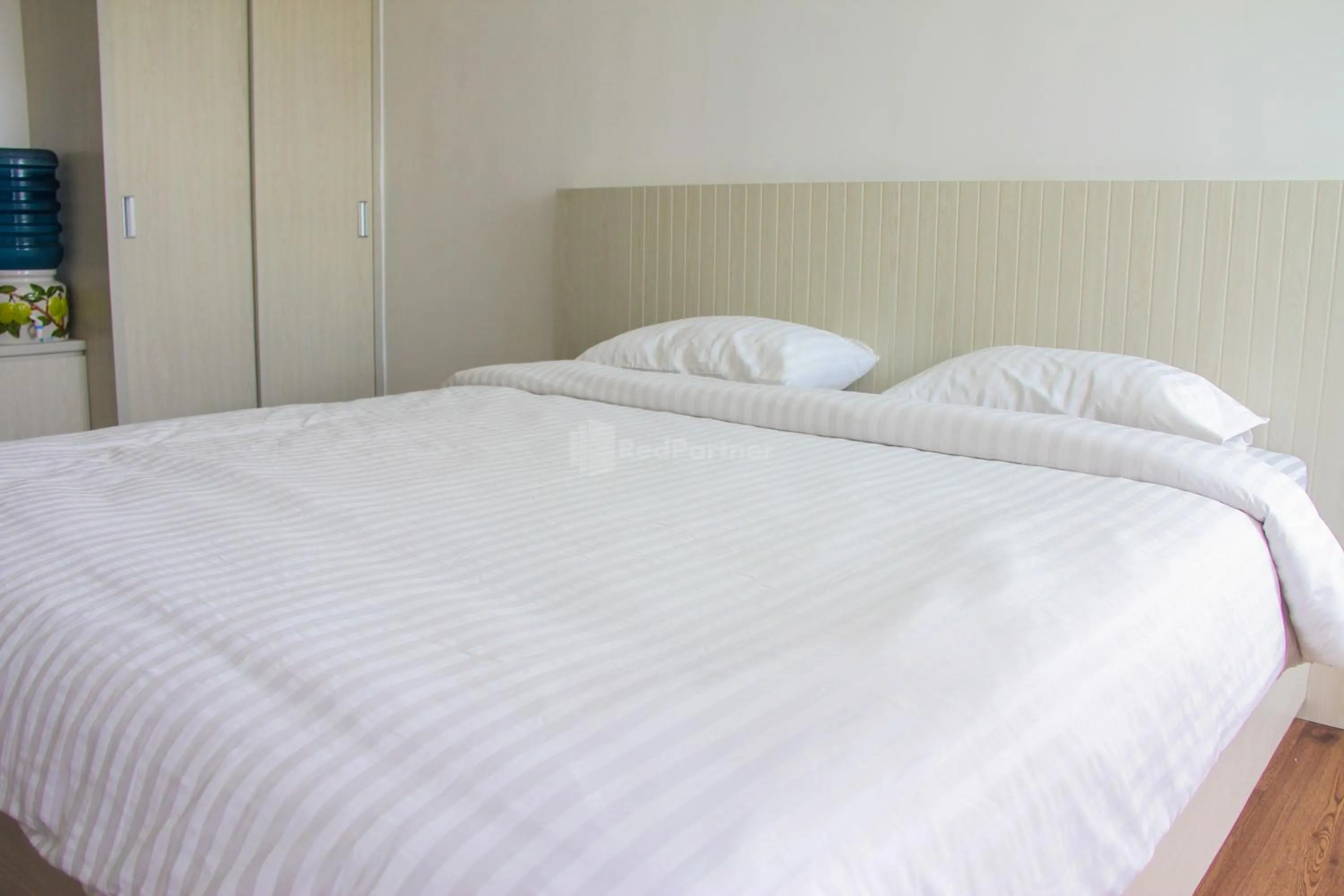 Bedroom in RedLiving Apartemen Gunung Putri Square - Abidin Room Tower Pinus