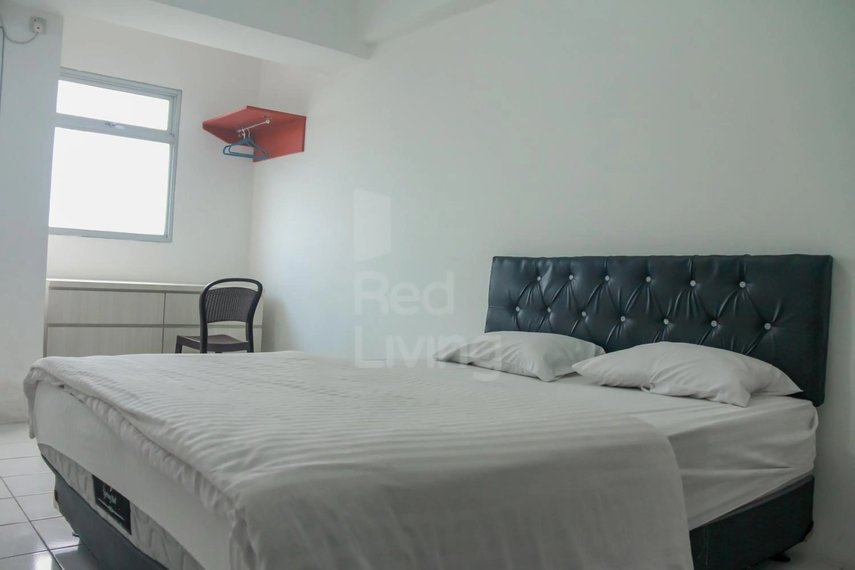 Bedroom in RedLiving Apartemen Gunung Putri Square - Abidin Room Tower Pinus