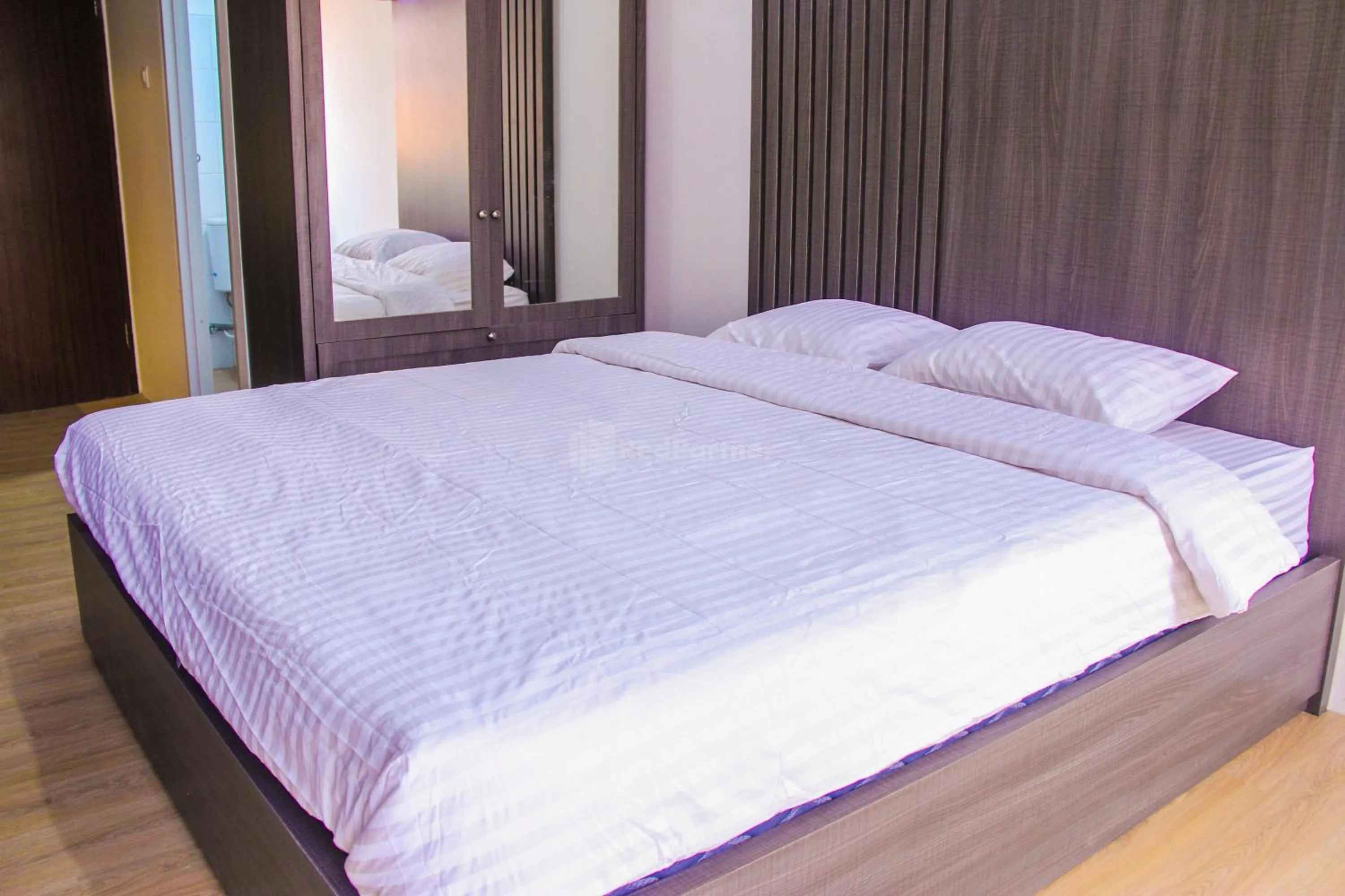 Bedroom in RedLiving Apartemen Gunung Putri Square - Abidin Room Tower Pinus