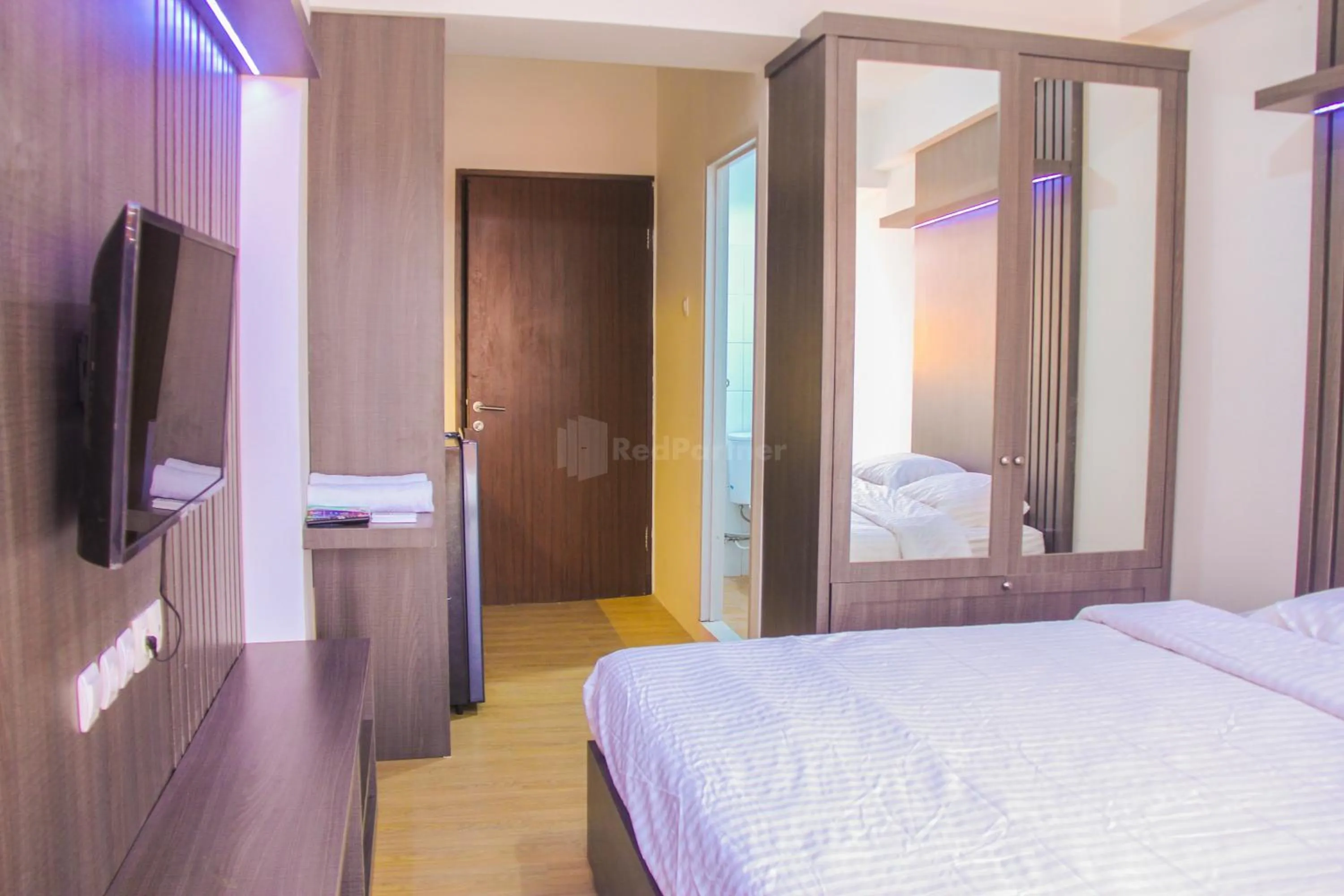 Bedroom in RedLiving Apartemen Gunung Putri Square - Abidin Room Tower Pinus