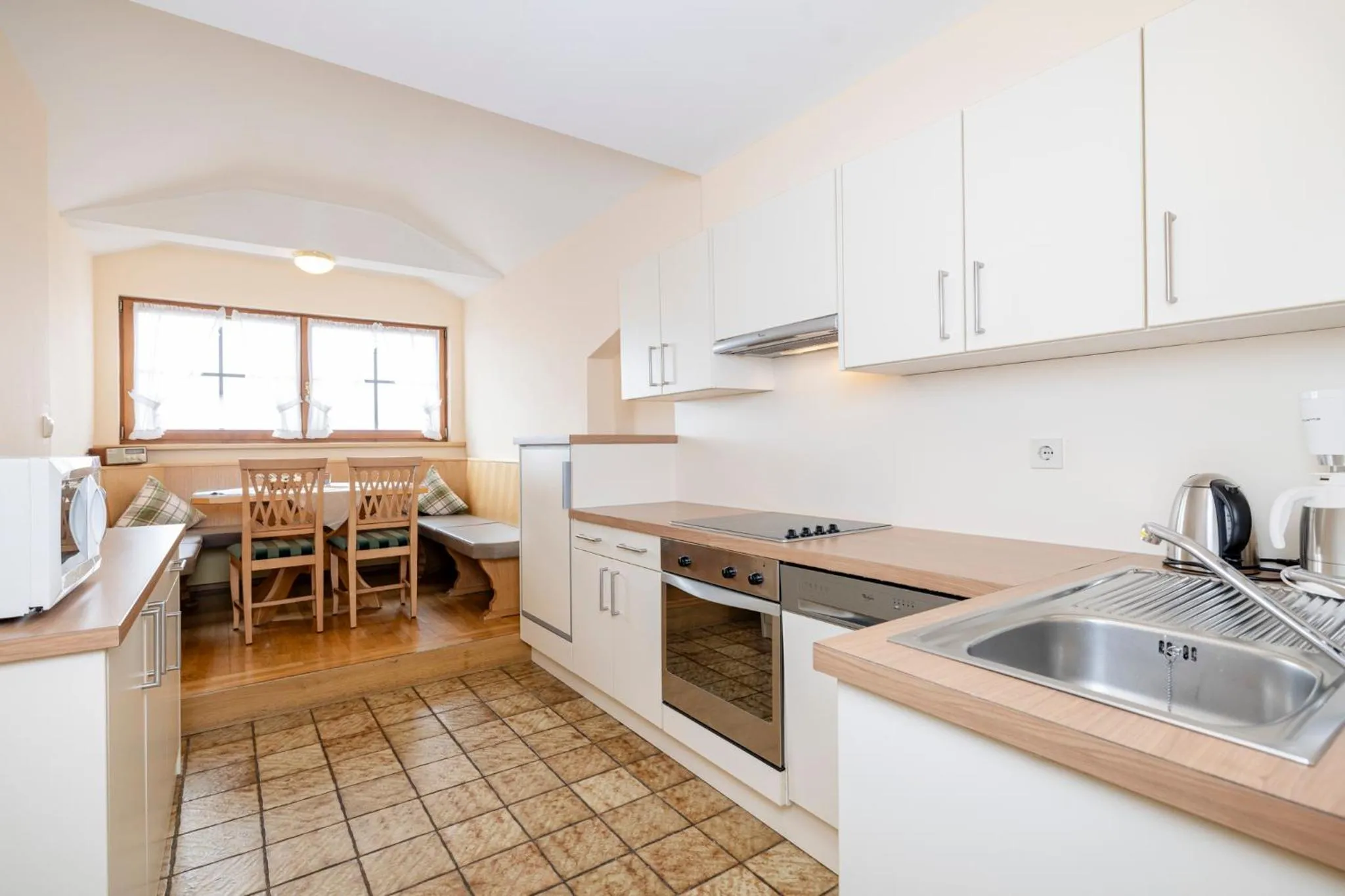 Kitchen or kitchenette in Aparthotel Landhaus St. Joseph (Indoor Pool)