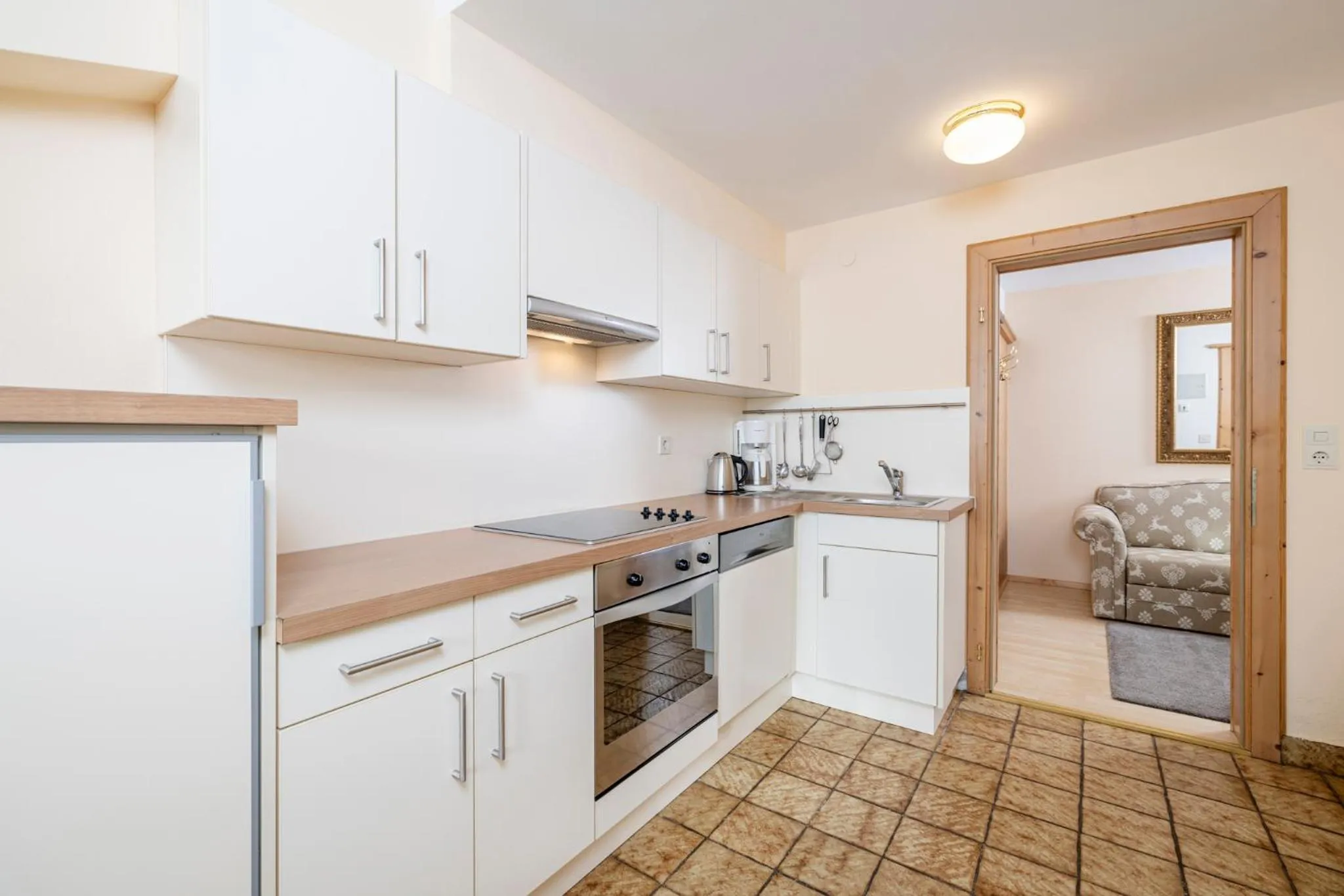 Kitchen or kitchenette in Aparthotel Landhaus St. Joseph (Indoor Pool)
