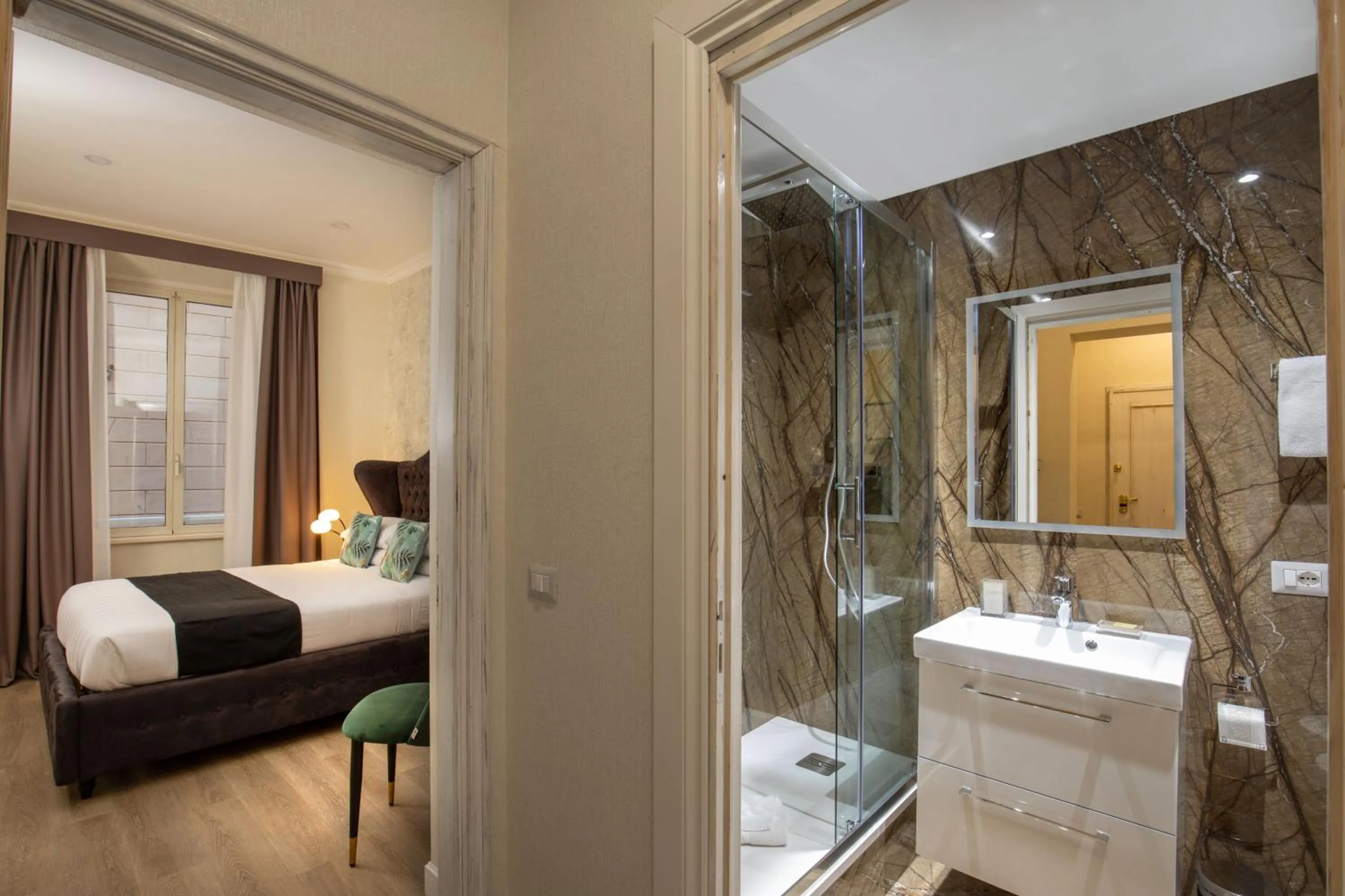 Bed in Condotti Boutique Hotel