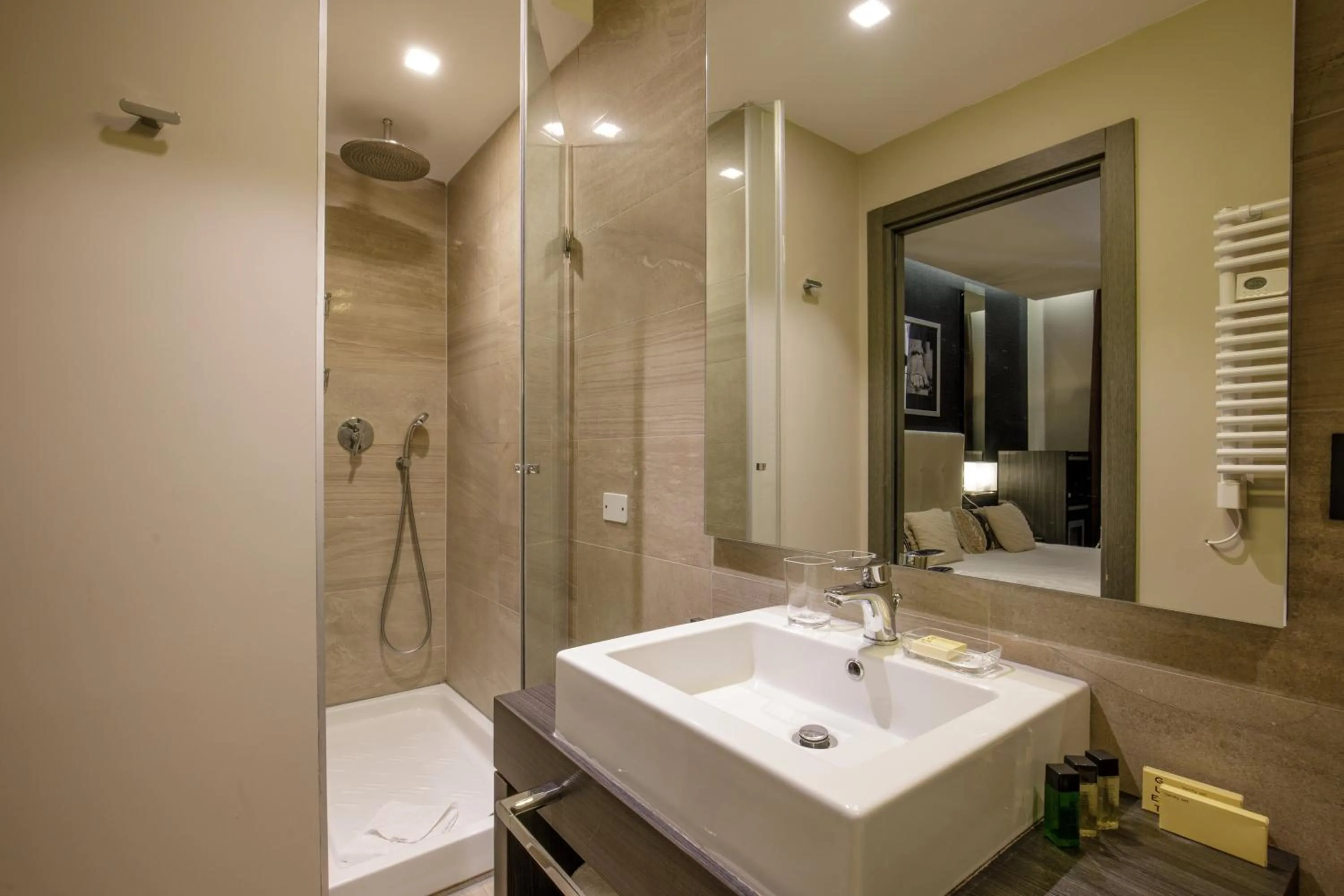 Bedroom in Condotti Boutique Hotel