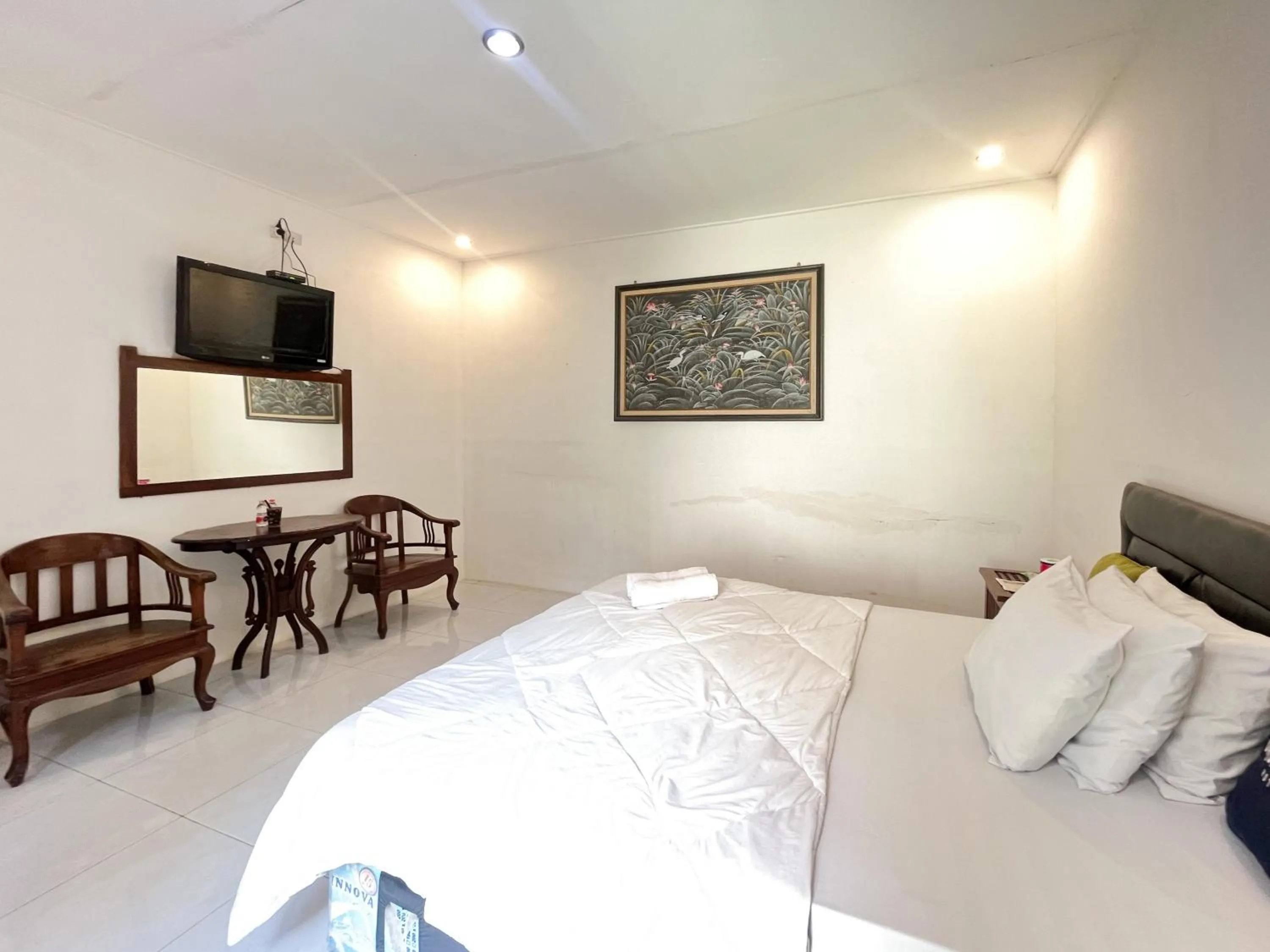 Bedroom, Bed in Urbanview Hotel Kumala Banyuwangi by RedDoorz