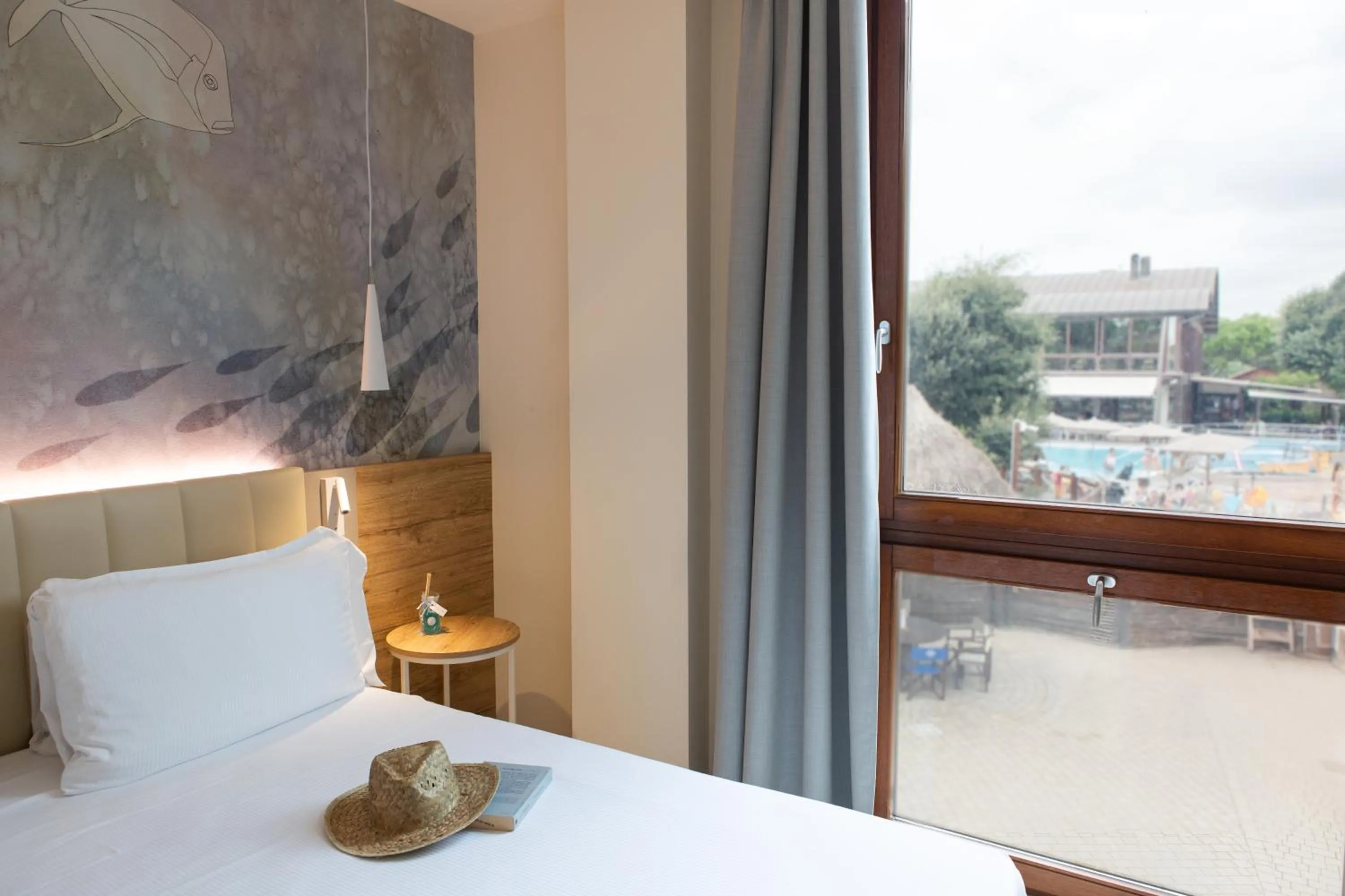 Bed in Canado Family Hotel