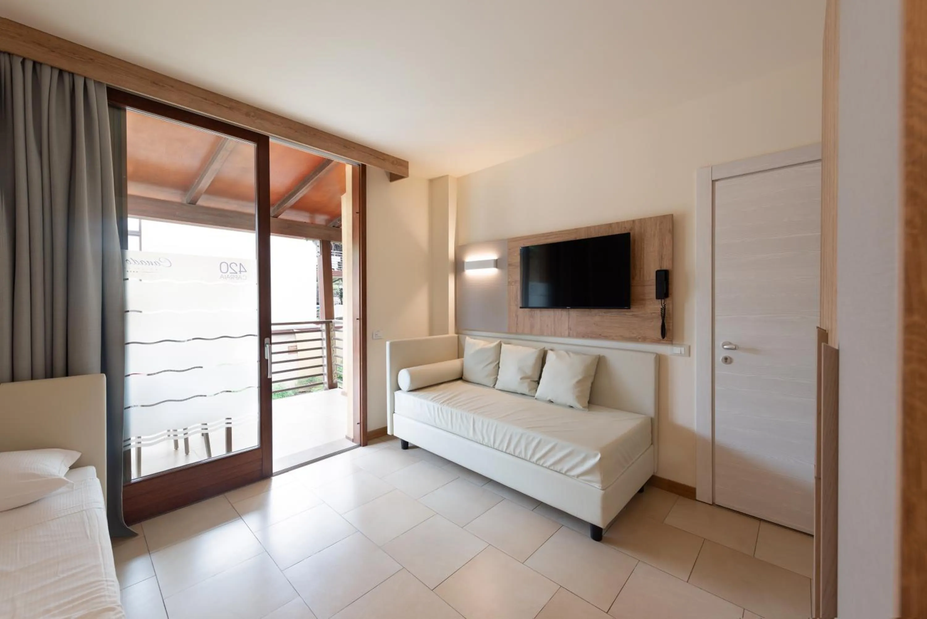 Bed in Canado Family Hotel