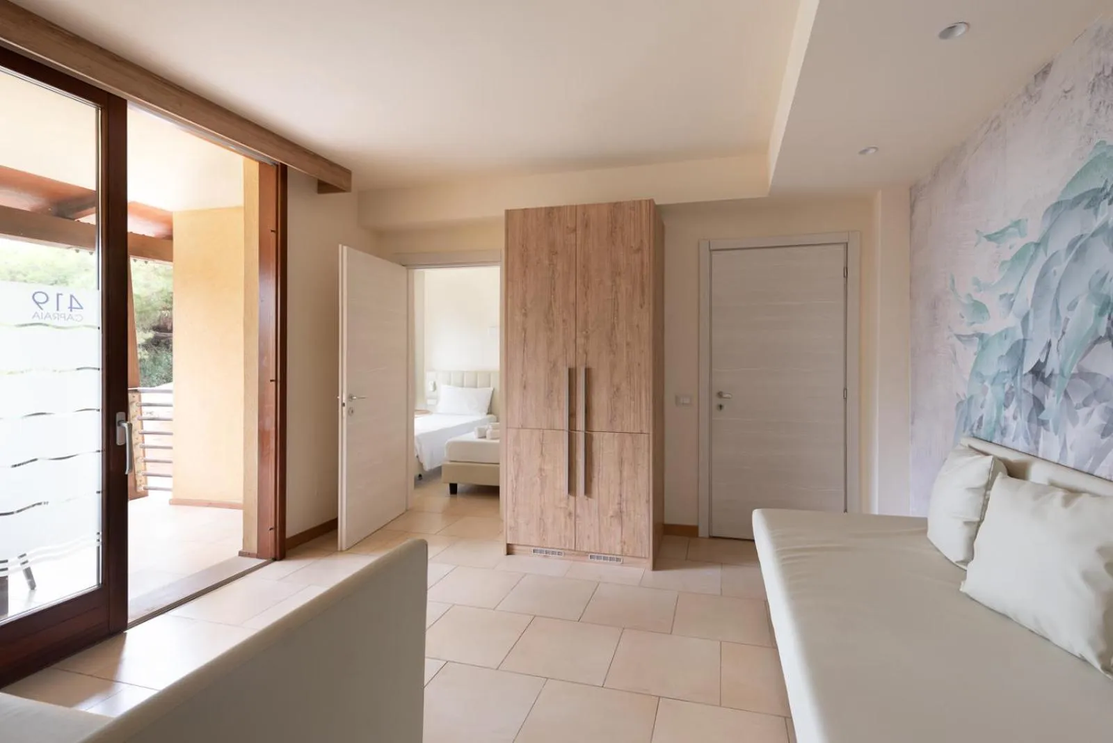 Living room, Bed in Canado Family Hotel