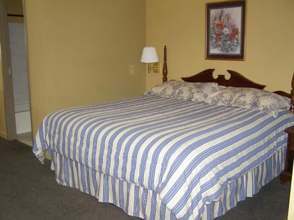 Bed in FIRST WESTERN INN