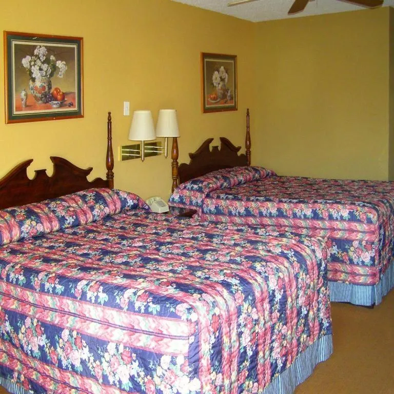 Bed in FIRST WESTERN INN