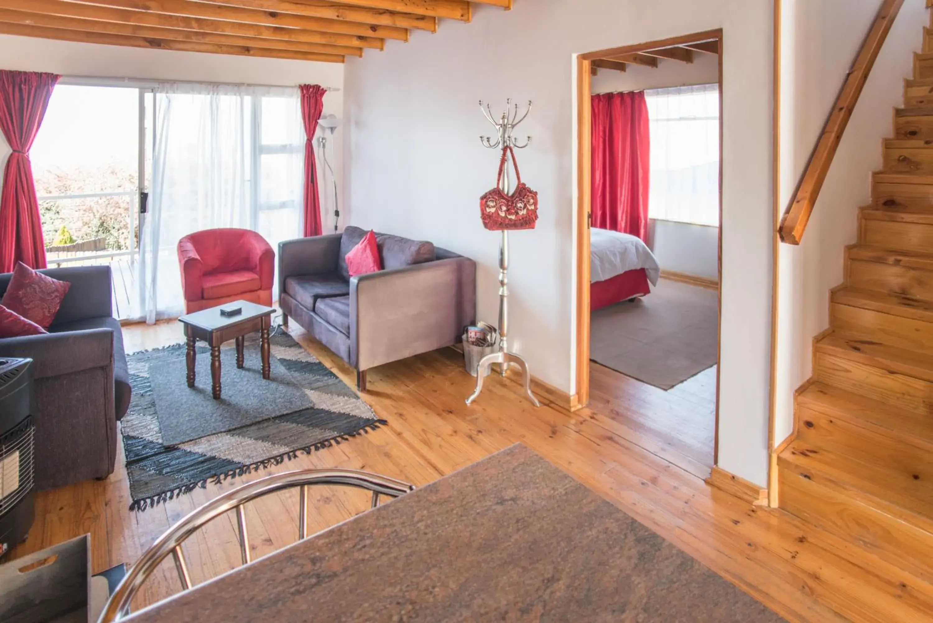 Communal lounge/ TV room in Knock Out View Clarens Communal lounge/ TV room in Knock Out View Clarens