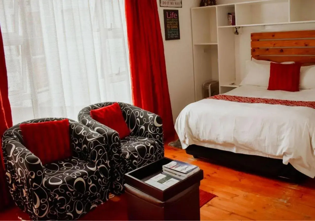 Seating area, Bed in Knock Out View Clarens Seating area, Bed in Knock Out View Clarens