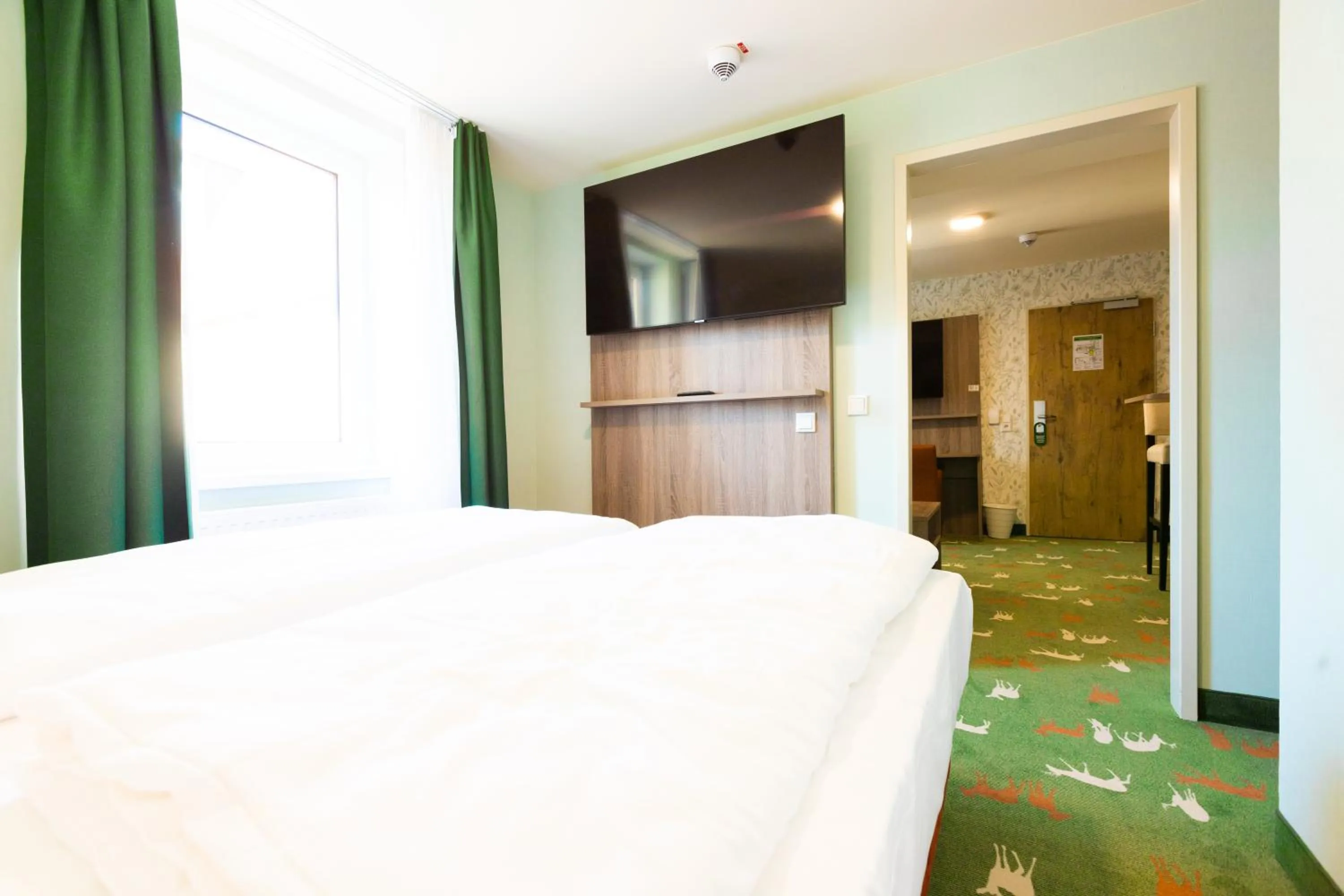 Bed in Hotel & Restaurant Hubertus Sehnde