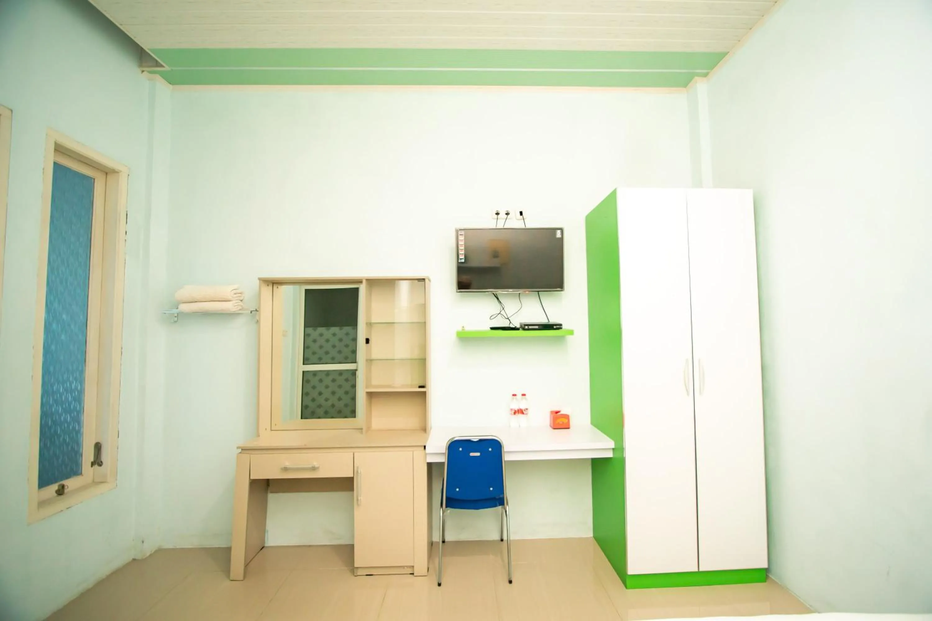 TV and multimedia in RedDoorz Syariah near Pantai Bali Abdya Blang Pidie