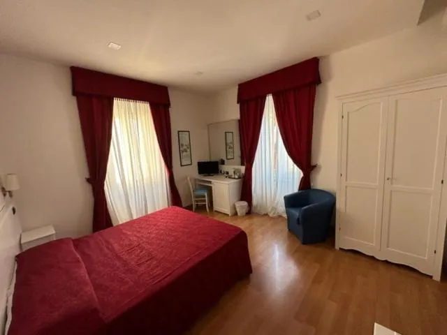 Bed in Hotel L'Isola