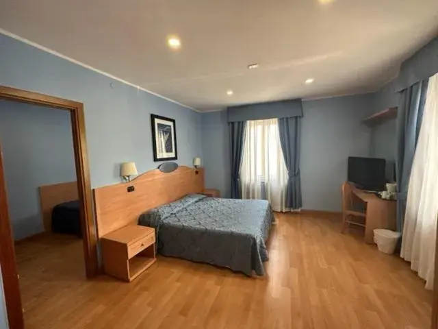 Standard Family Room - single occupancy in Hotel L'Isola Standard Family Room - single occupancy in Hotel L'Isola