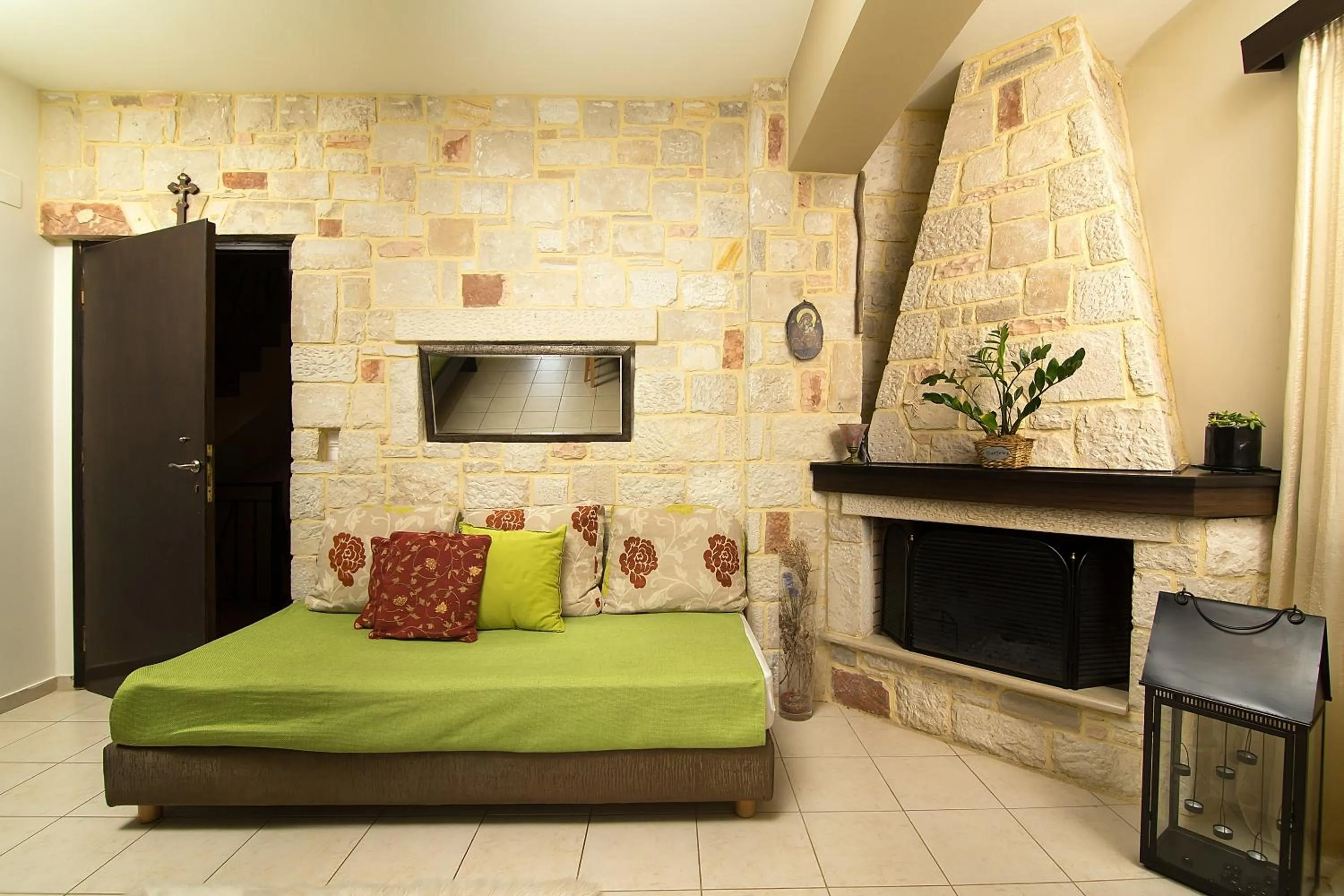 Living room, Bed in Home Suites