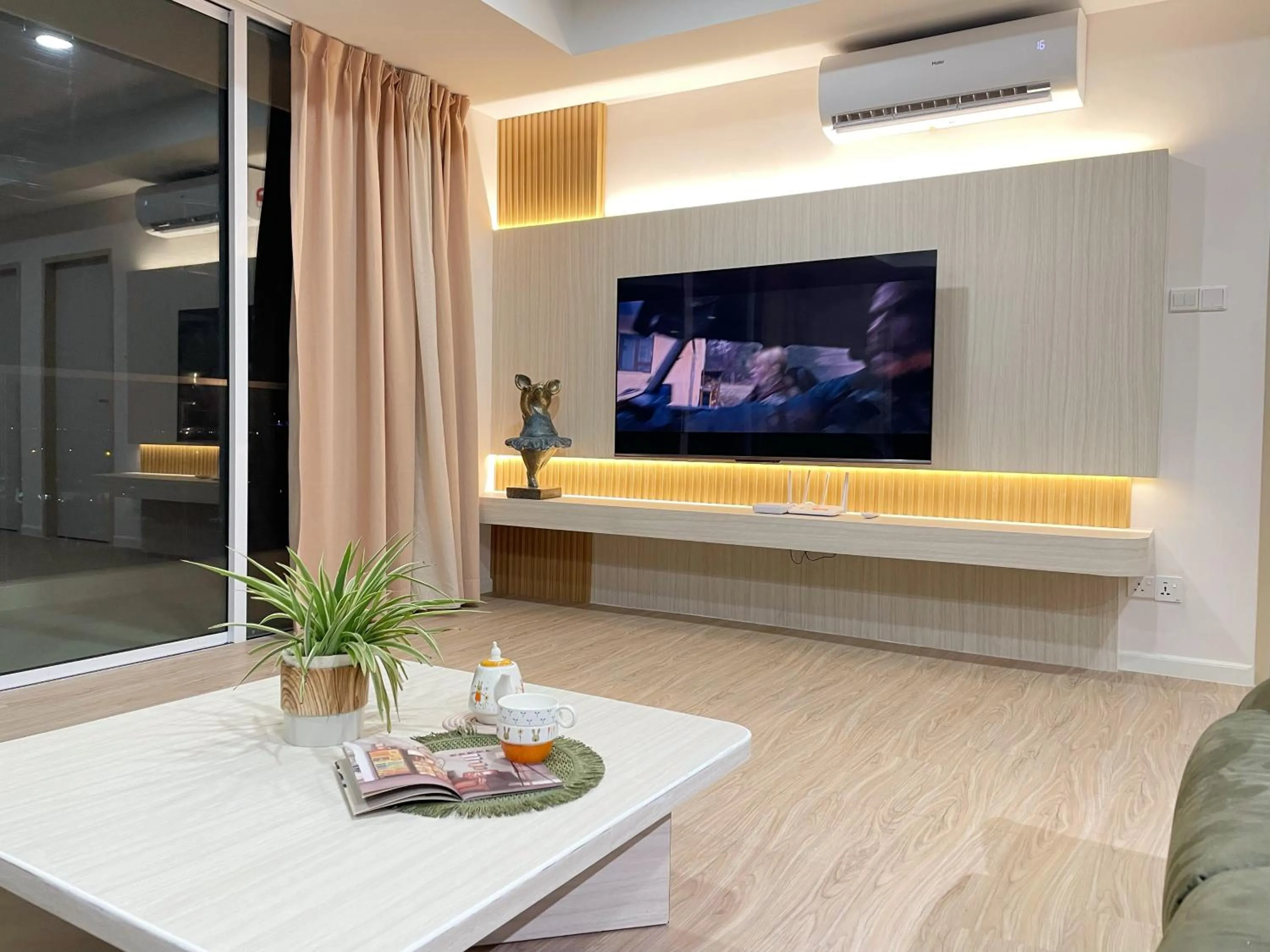TV and multimedia in QUEENSLAND SUITES at Aru Suites, Kota Kinabalu