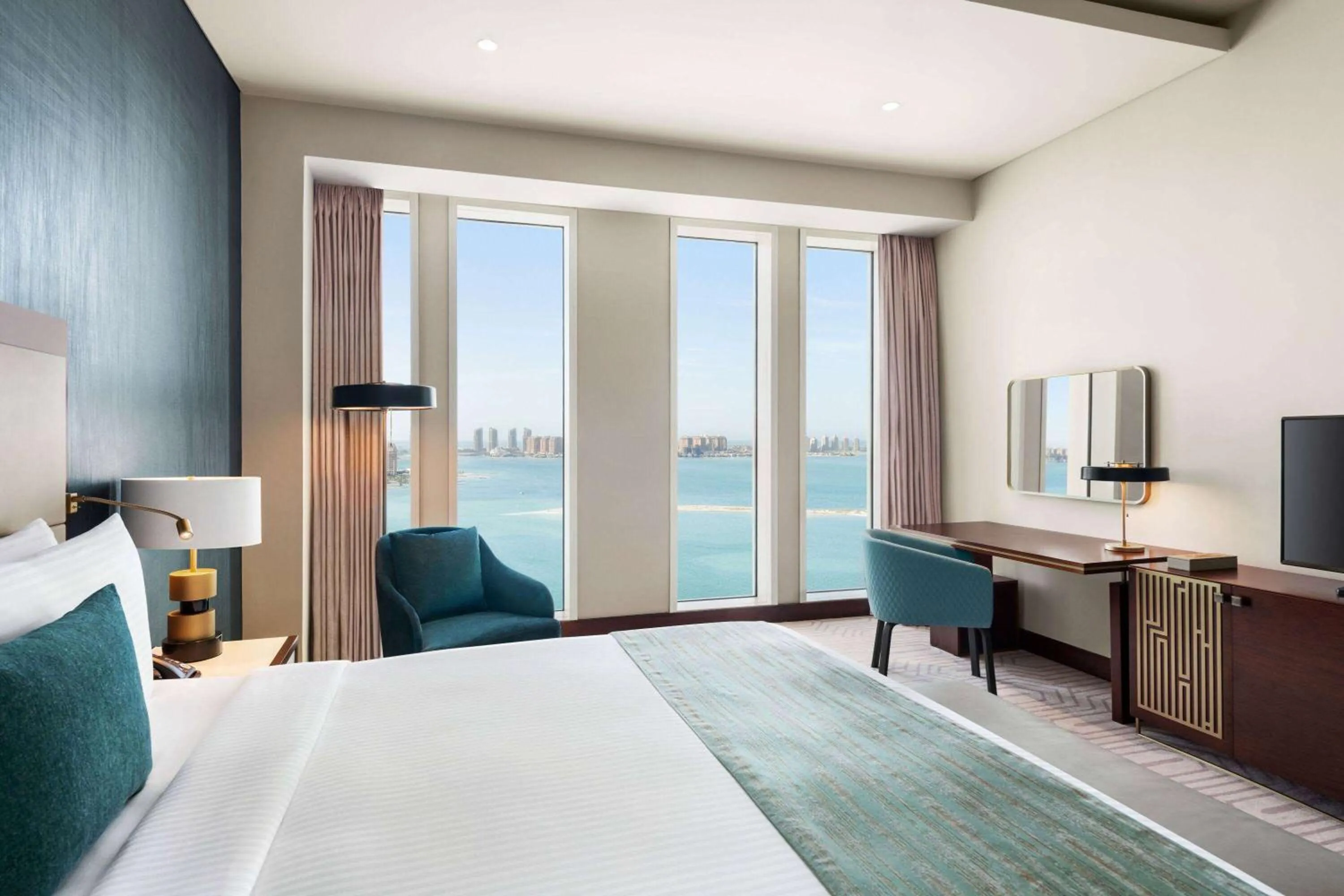 Photo of the whole room, Bed in Wyndham Grand Doha West Bay Beach