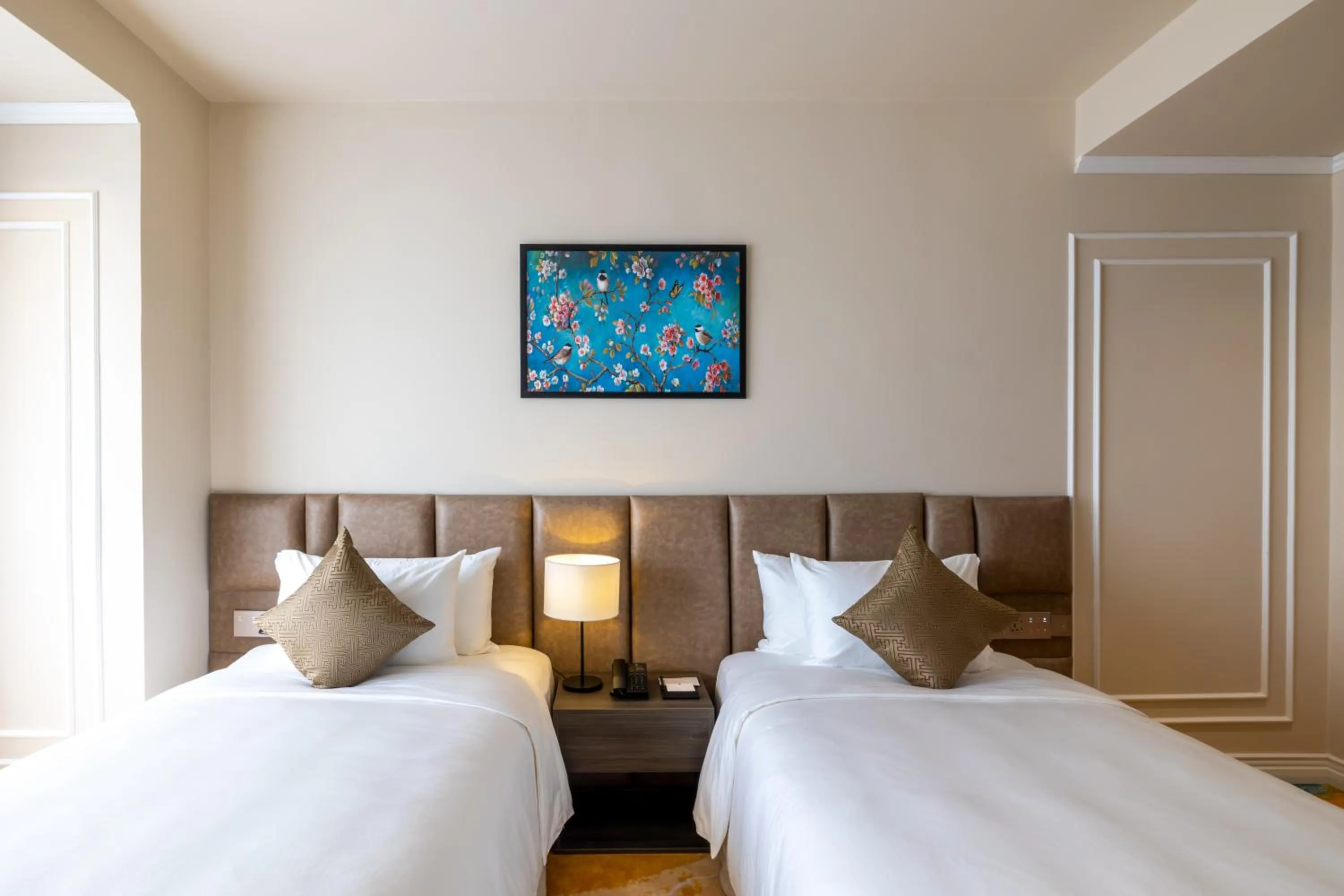 Bed in La Vela Hue Hotel