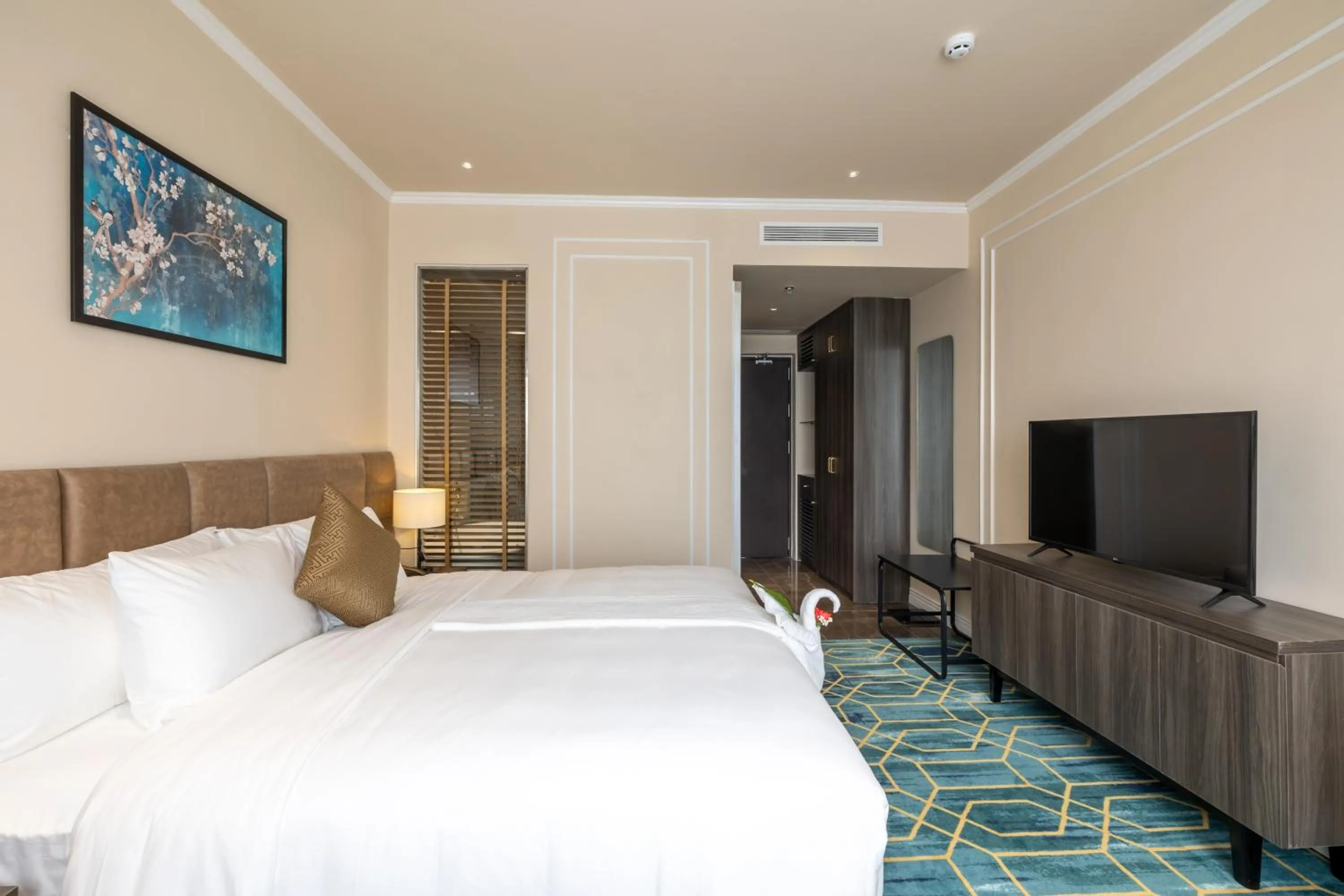 Bed in La Vela Hue Hotel