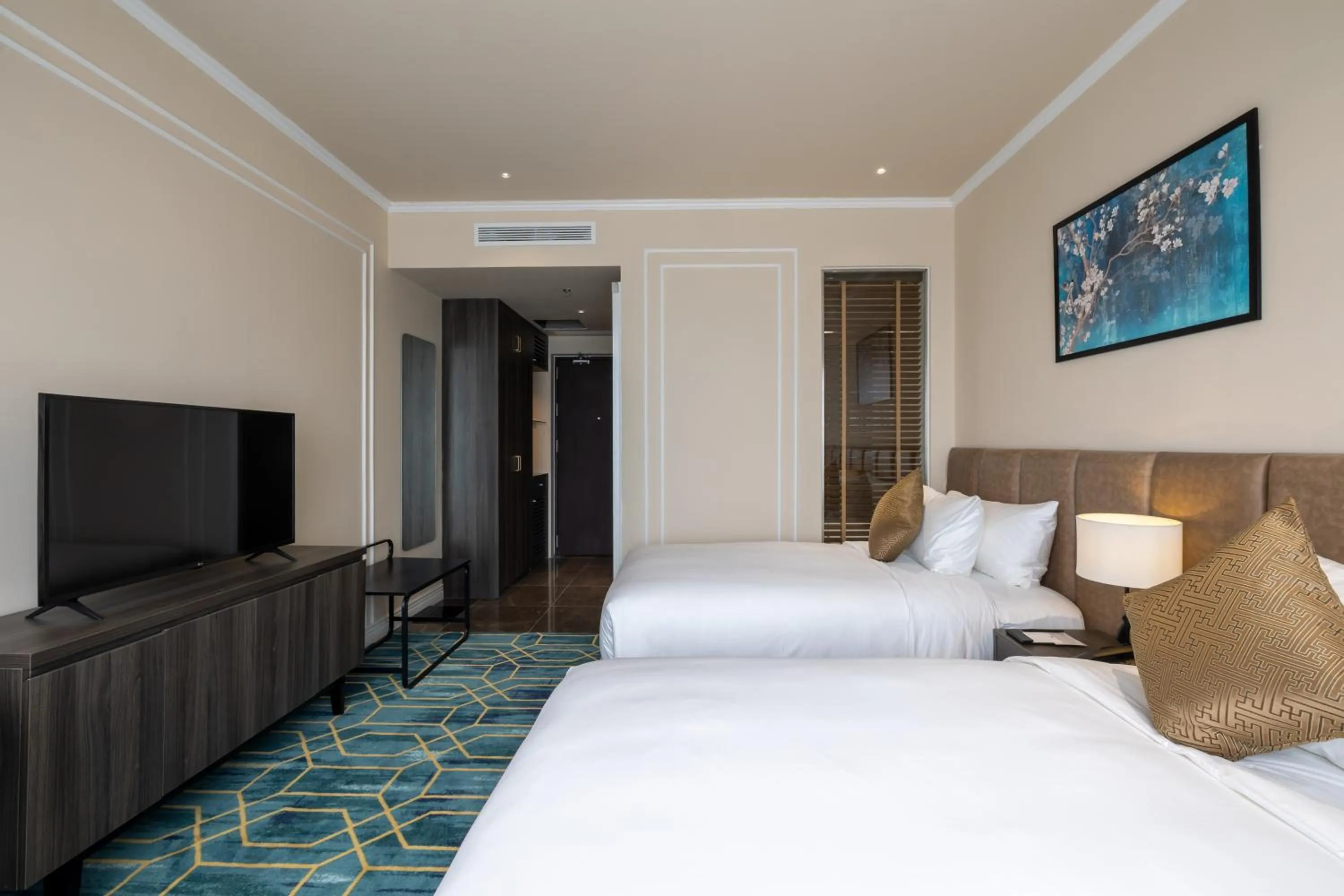 Bed in La Vela Hue Hotel