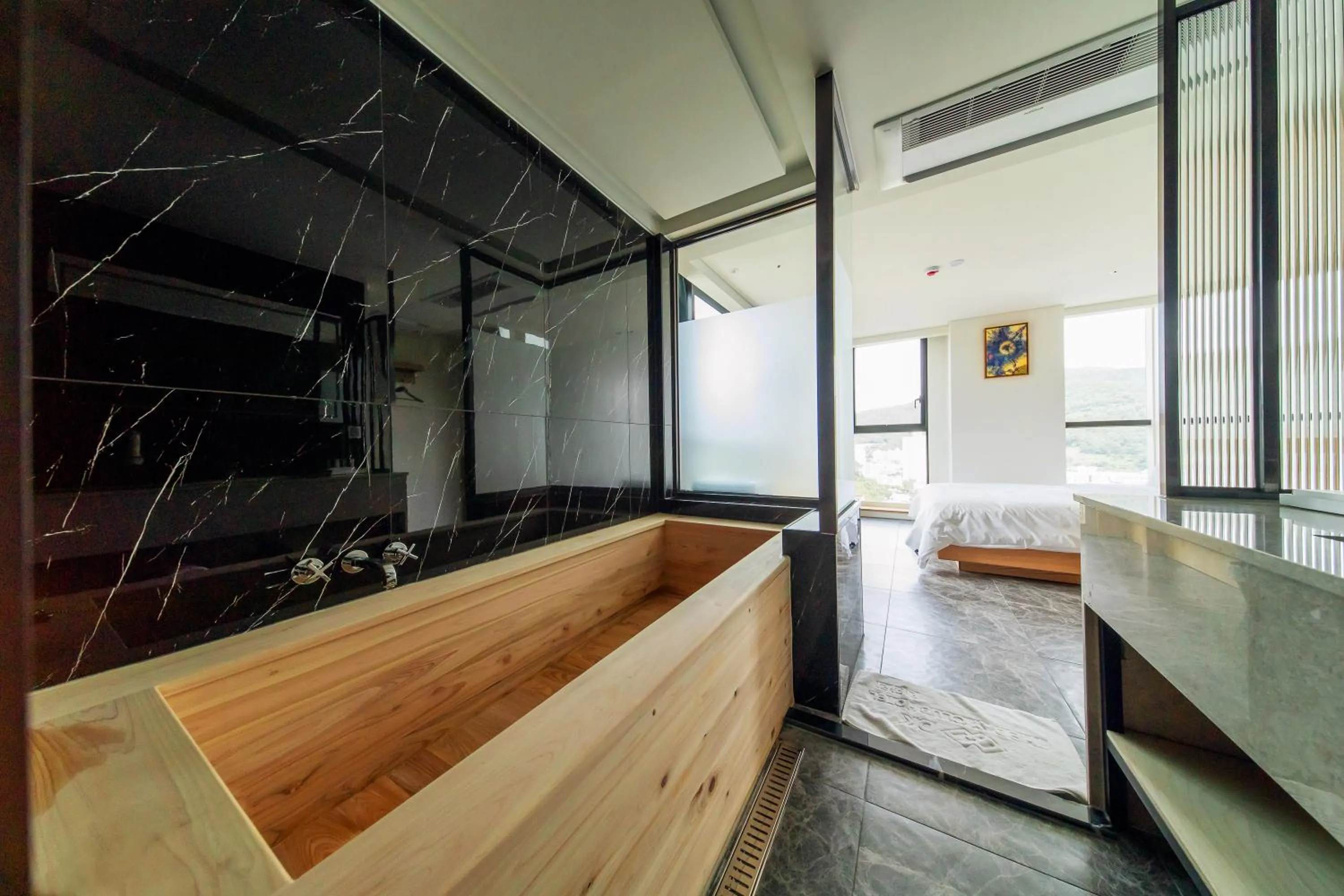 Bathroom, Bed in The Club Hotel Gijang Yeonhwari