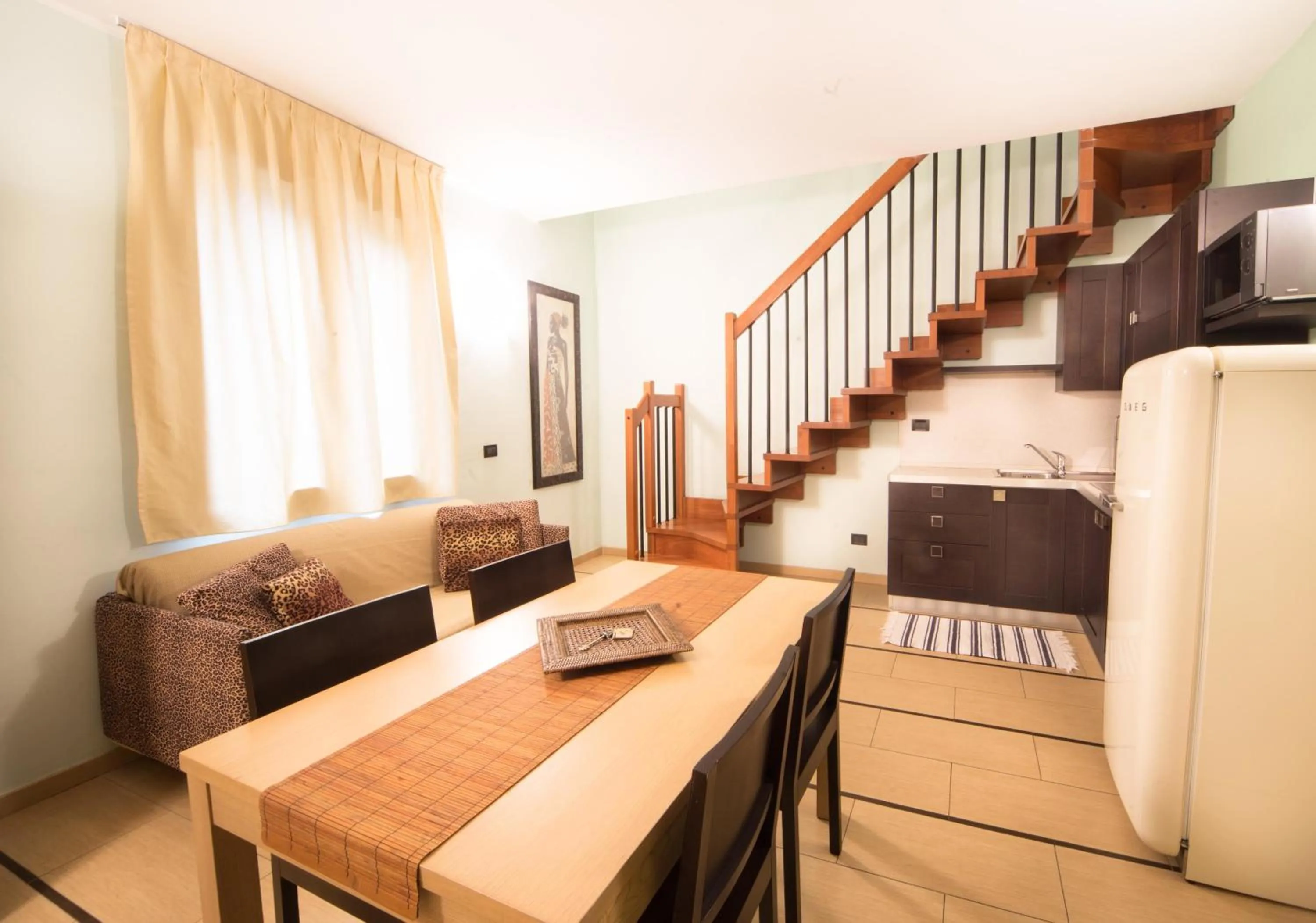 Kitchen or kitchenette in World Village Apartments