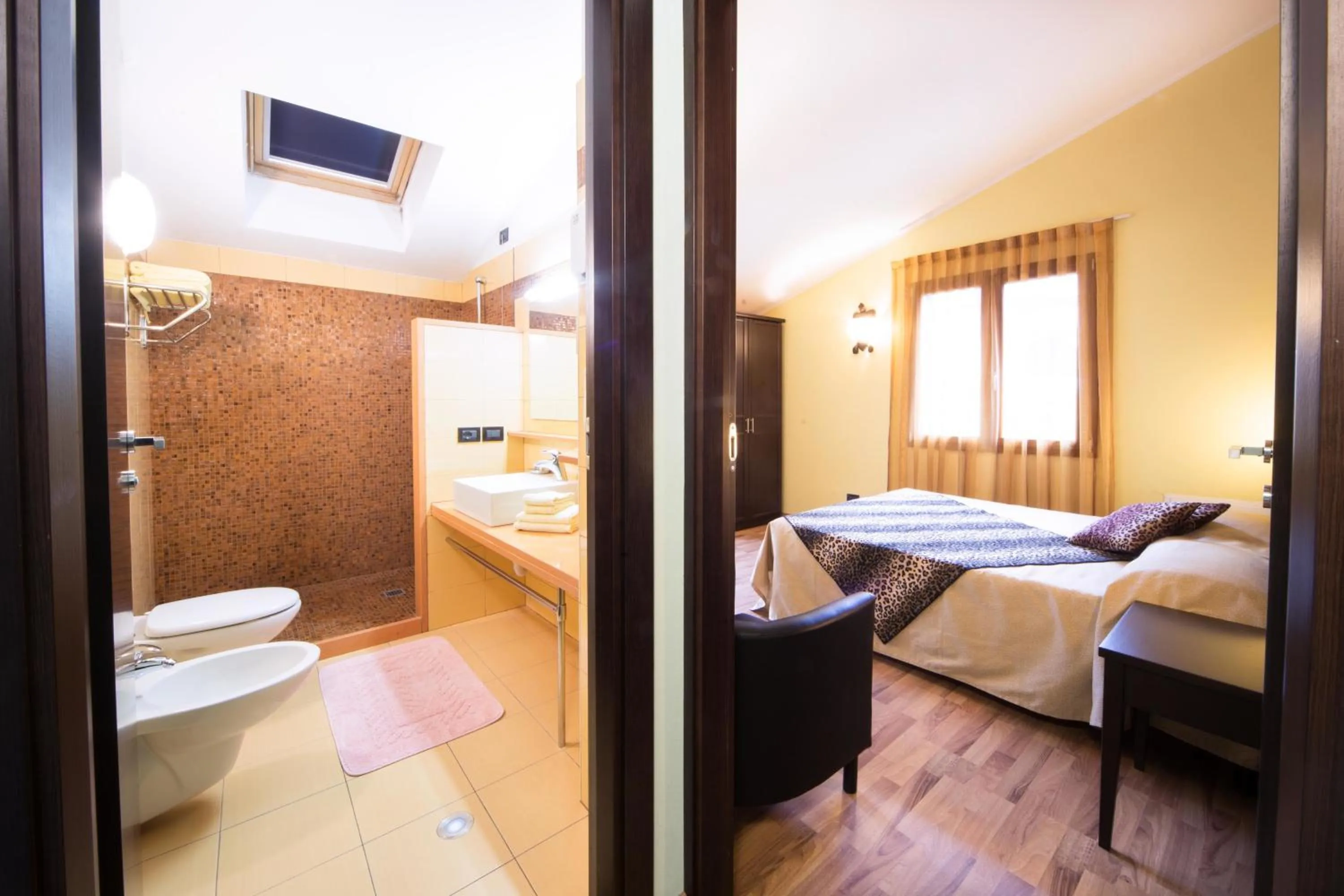 Bathroom, Bed in World Village Apartments