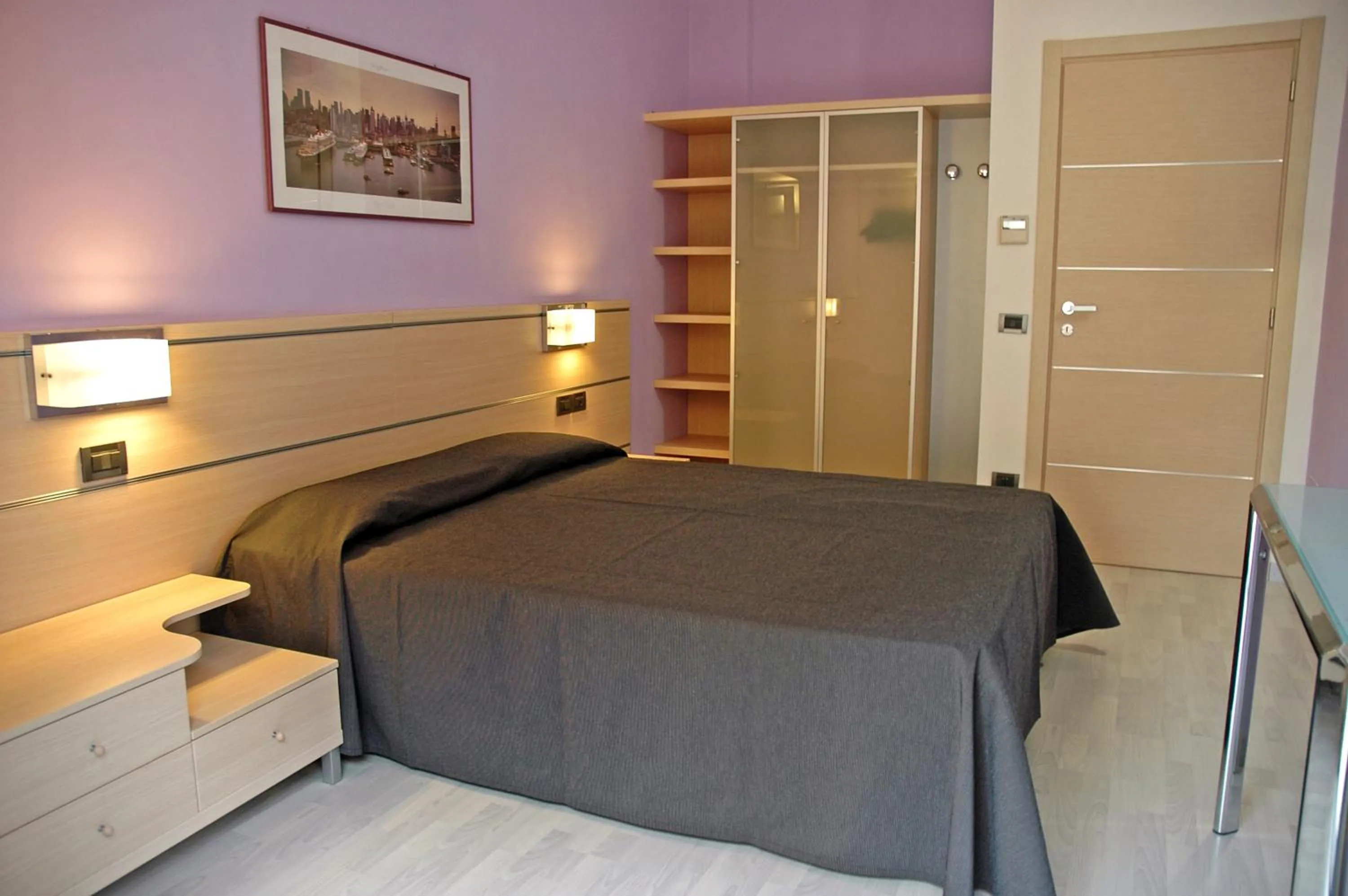 Bed in World Village Apartments