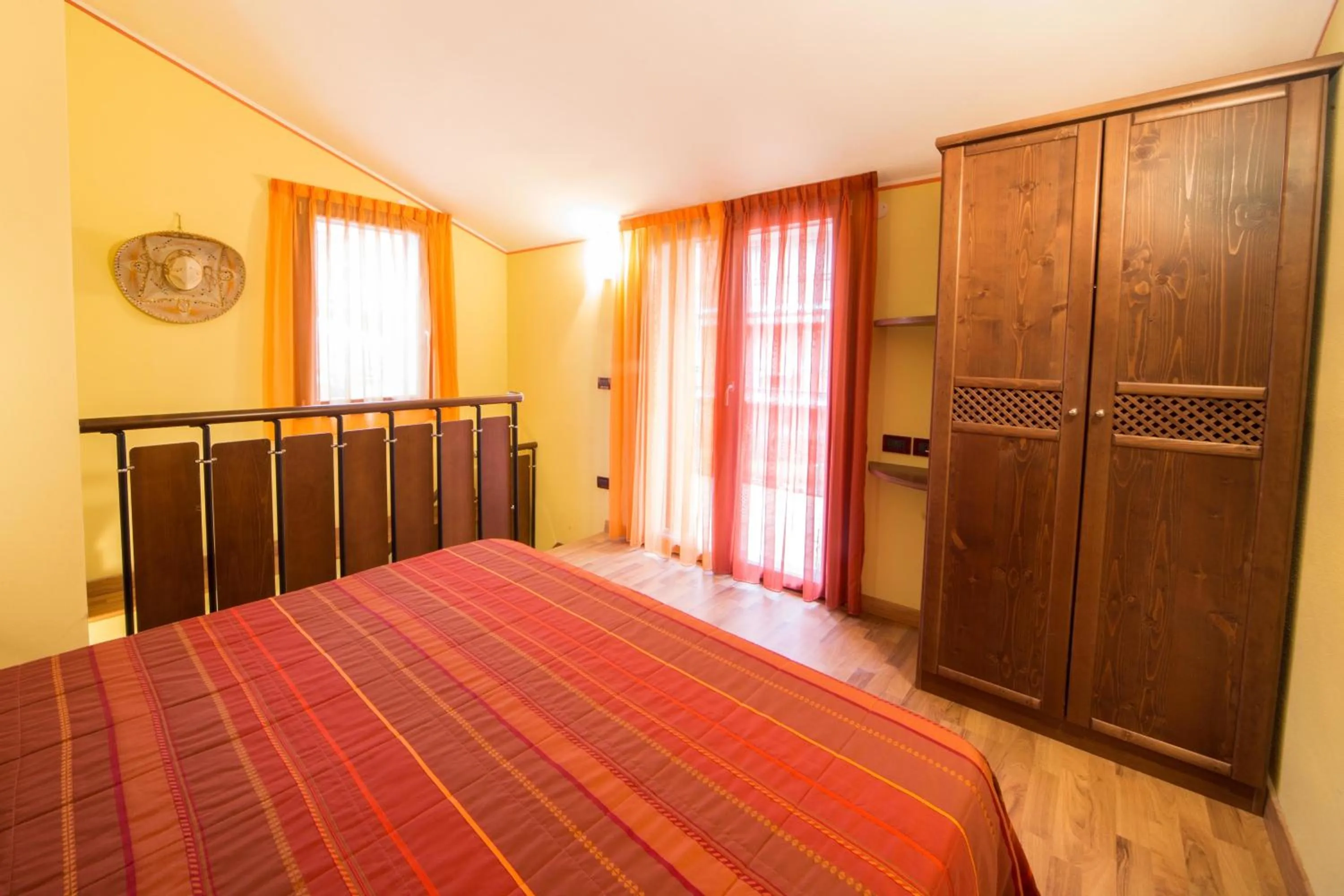 Bed in World Village Apartments