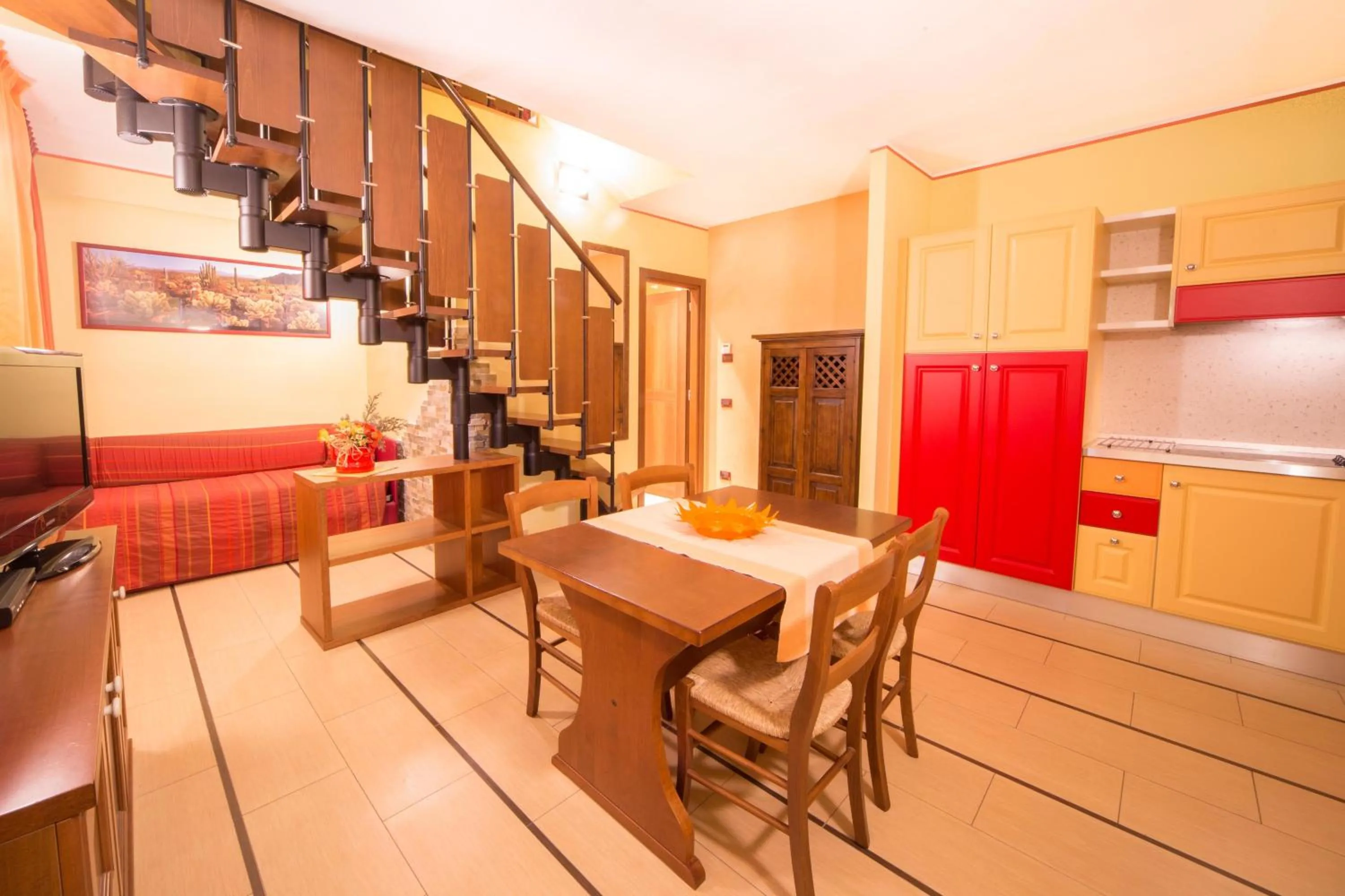 Kitchen or kitchenette in World Village Apartments