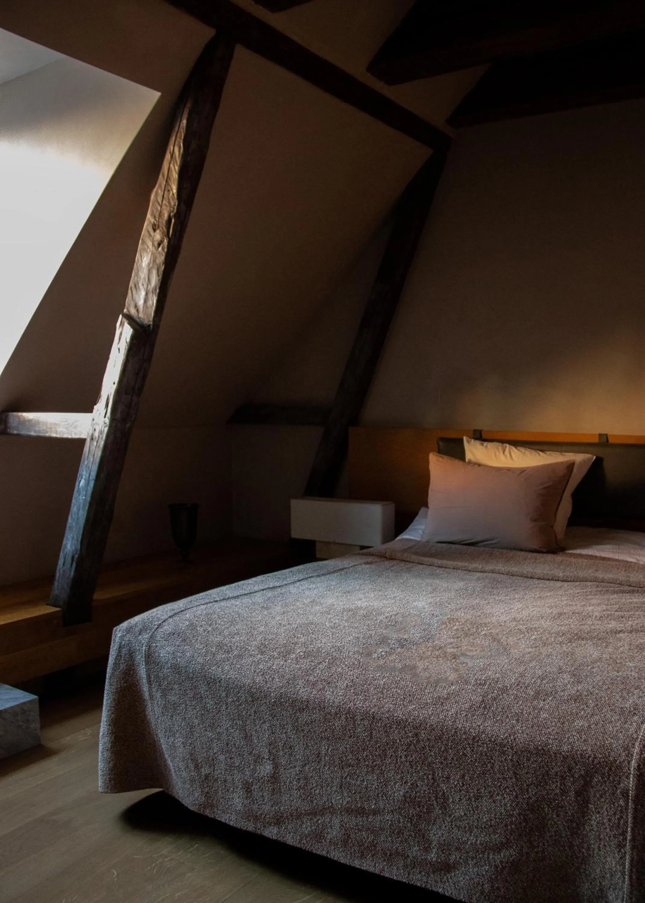 Bed in Audo Boutique Hotel